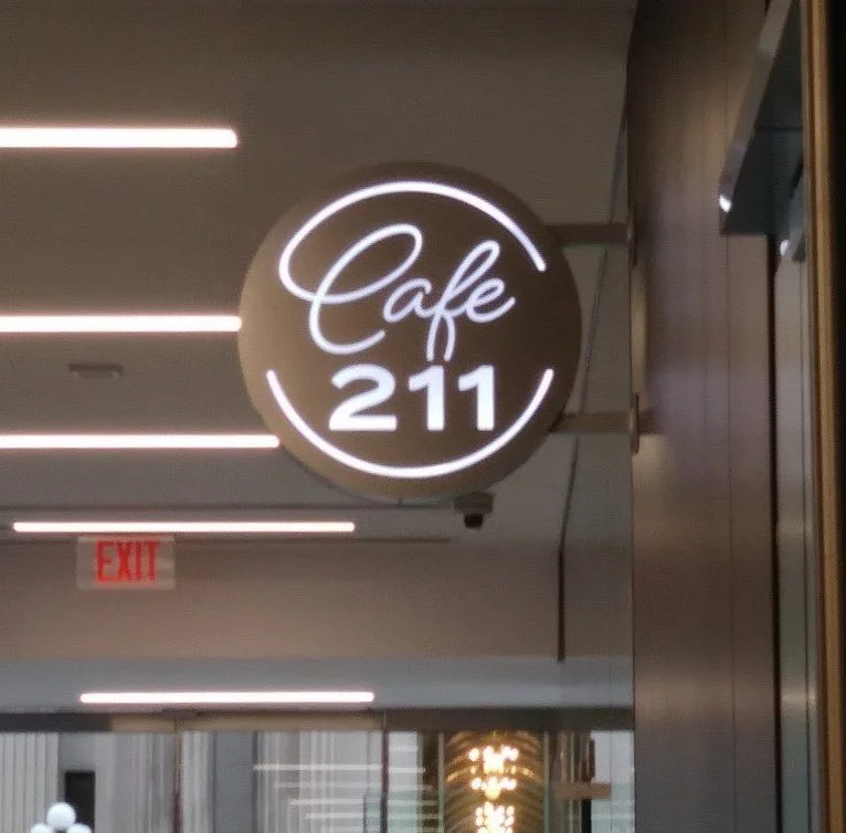 Cafe 211 Lobby Blade Sign 1.jpg