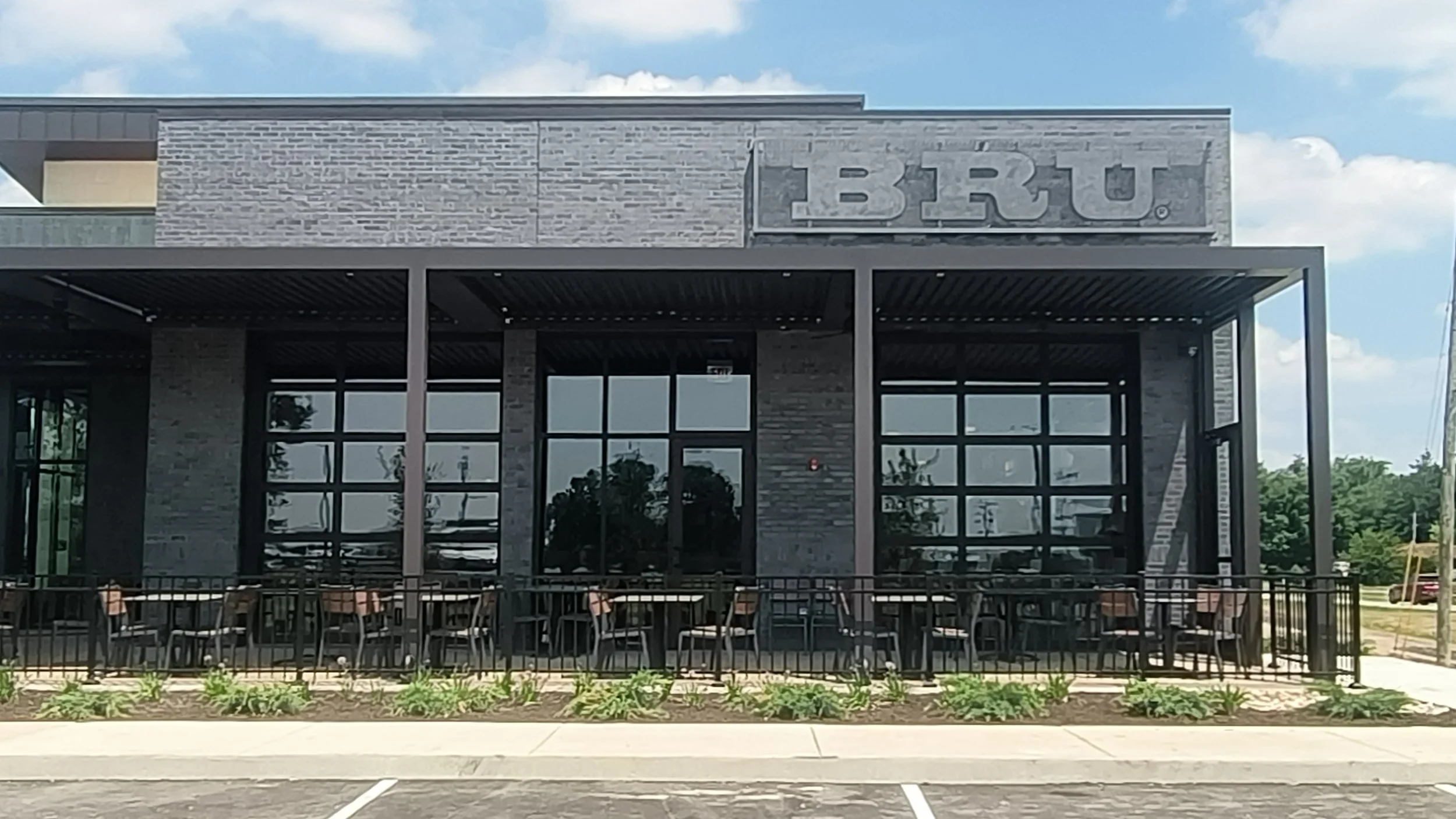Front view of a modern restaurant building with a large 