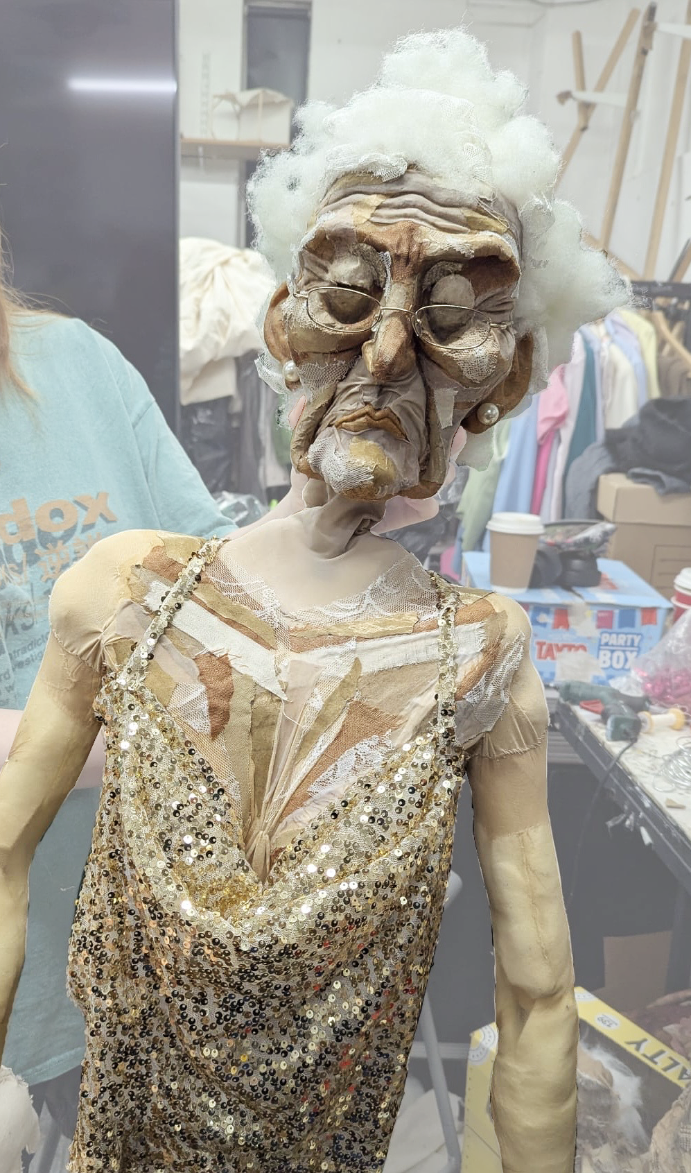 Made her a gold sequined top and some hair out of pillow stuffing and lace 