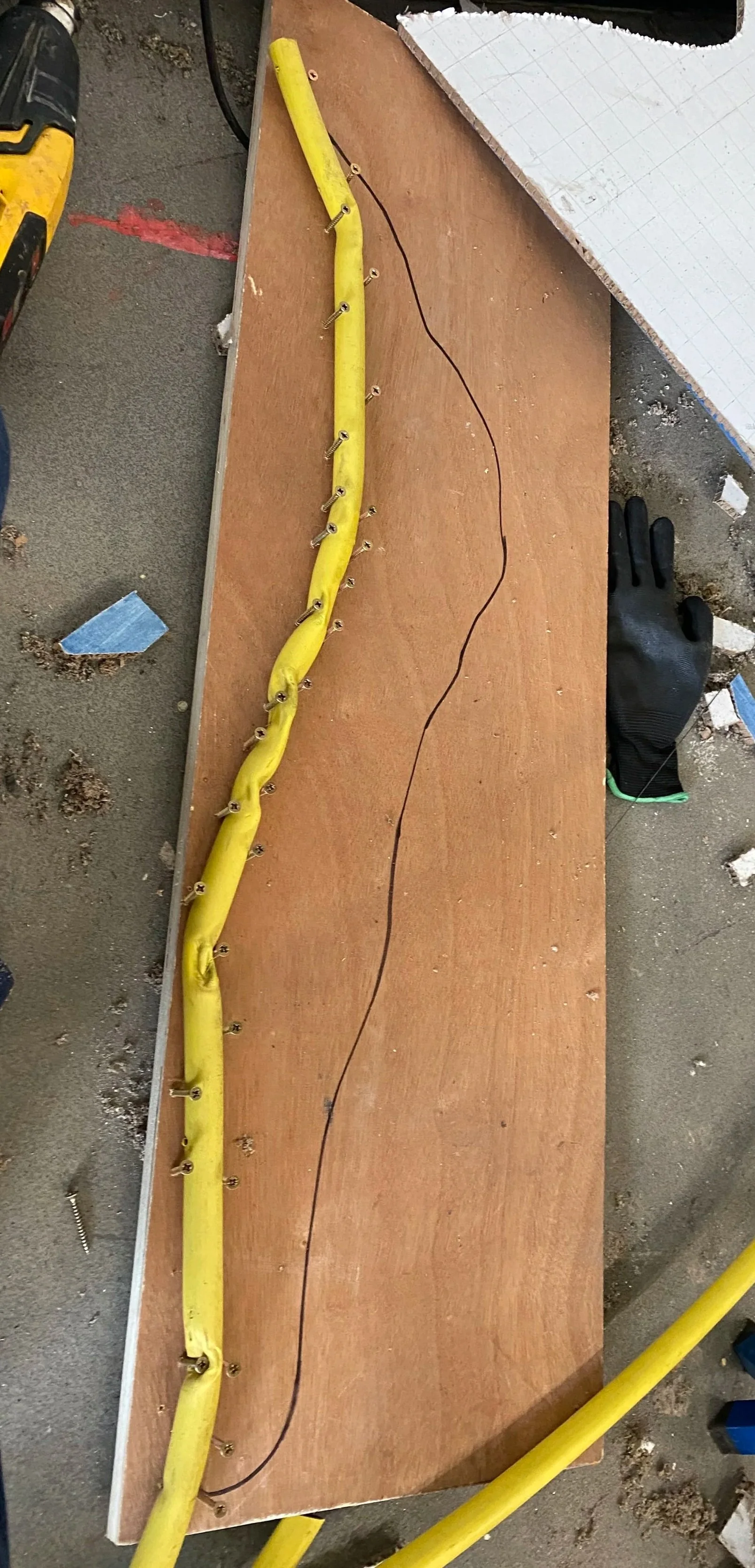 For the jaw I heated up pipe and bent it around nails I had drilled into some wood. 