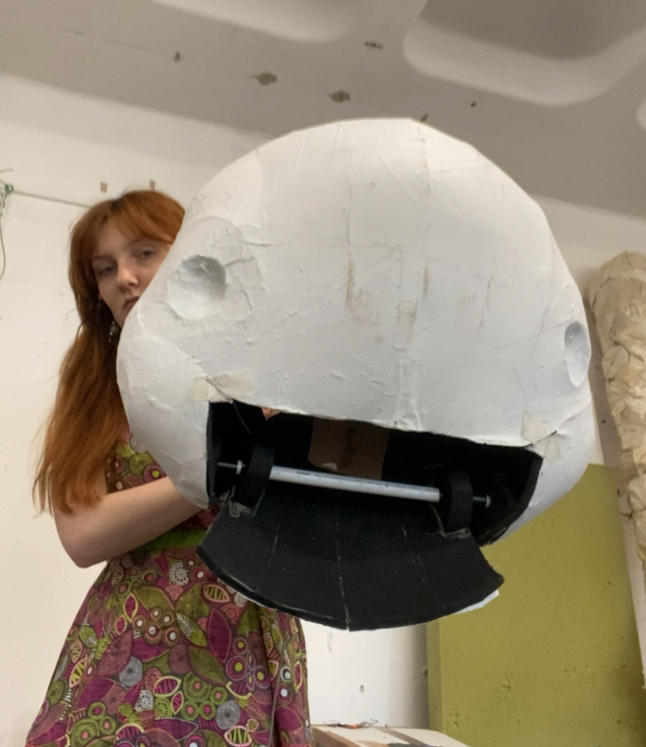 Scrimmed and painted the outside then cut out the mouth so I could add a mech to make it open and close. 