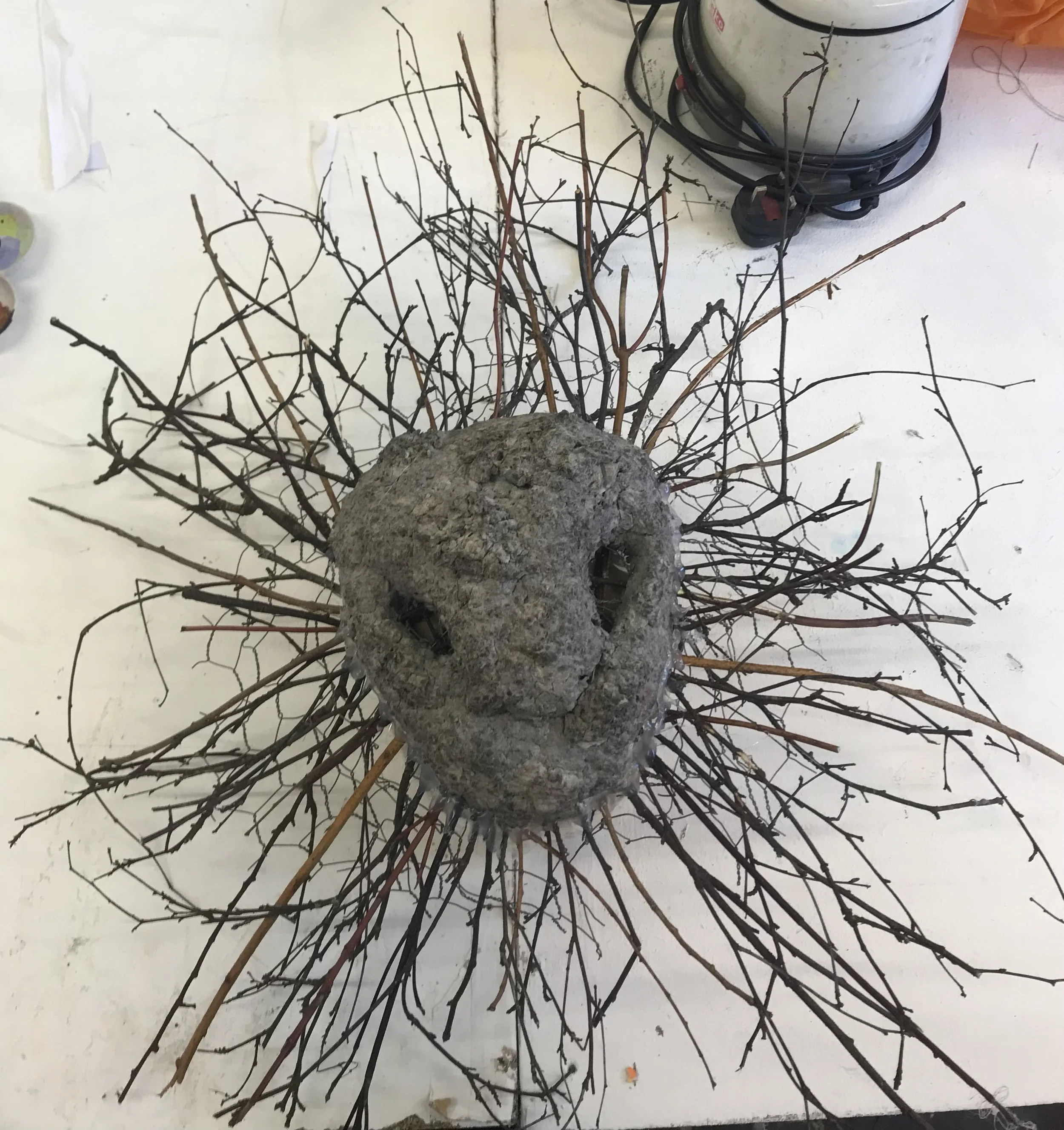 Sculpted the head onto the chicken wire with the paper pulp.