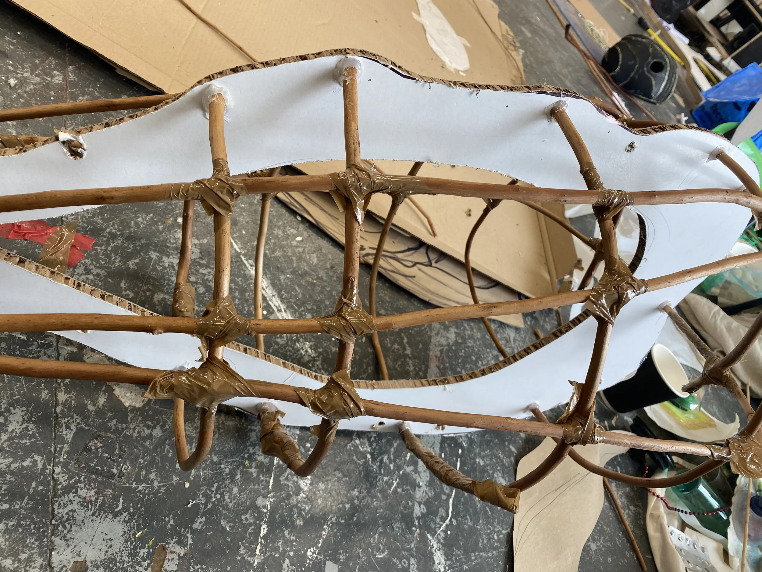 Threaded withy circles through the face to build it out. 