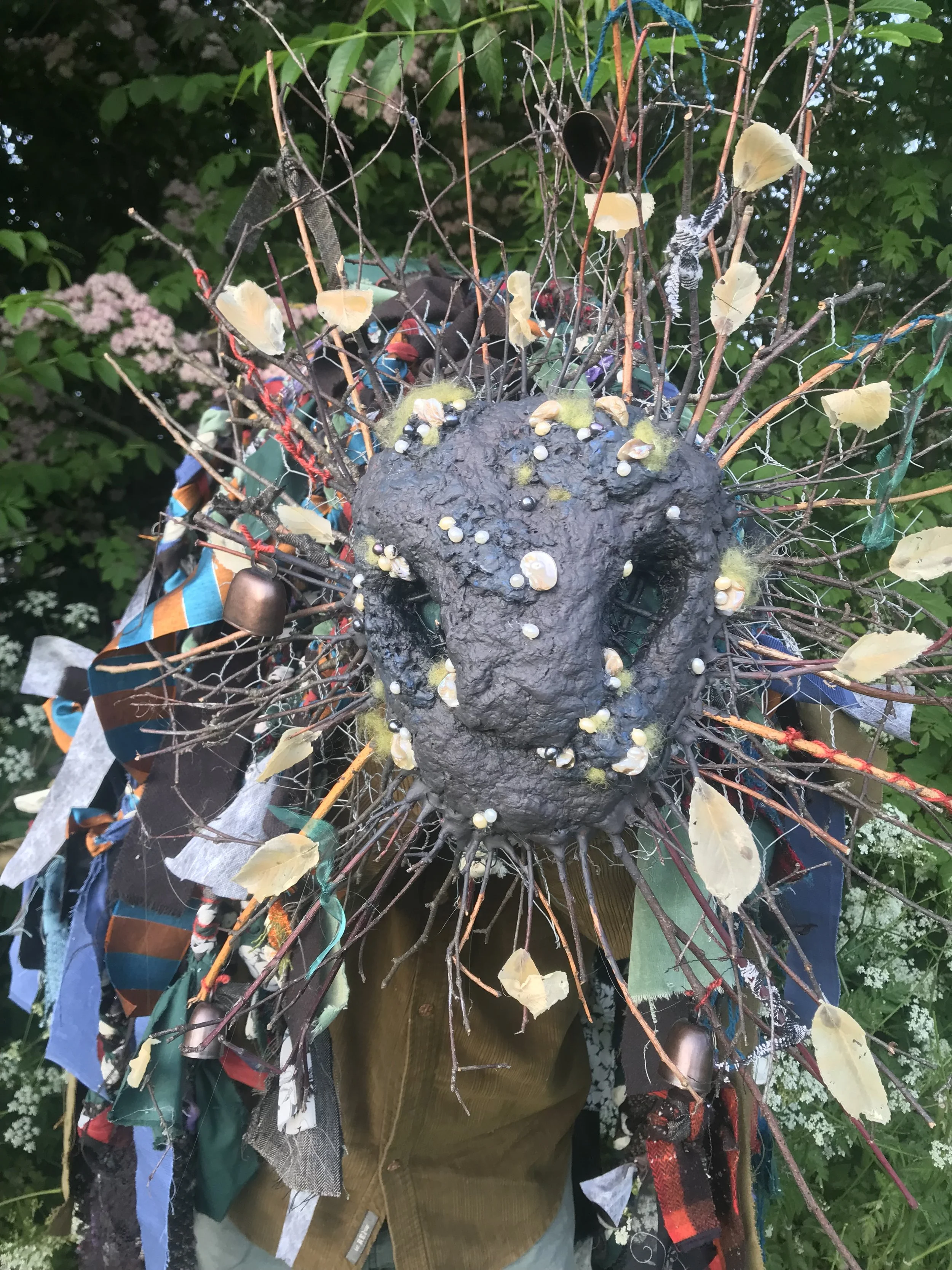 Tied trinkets and bells to the face so it jingles when it moves 