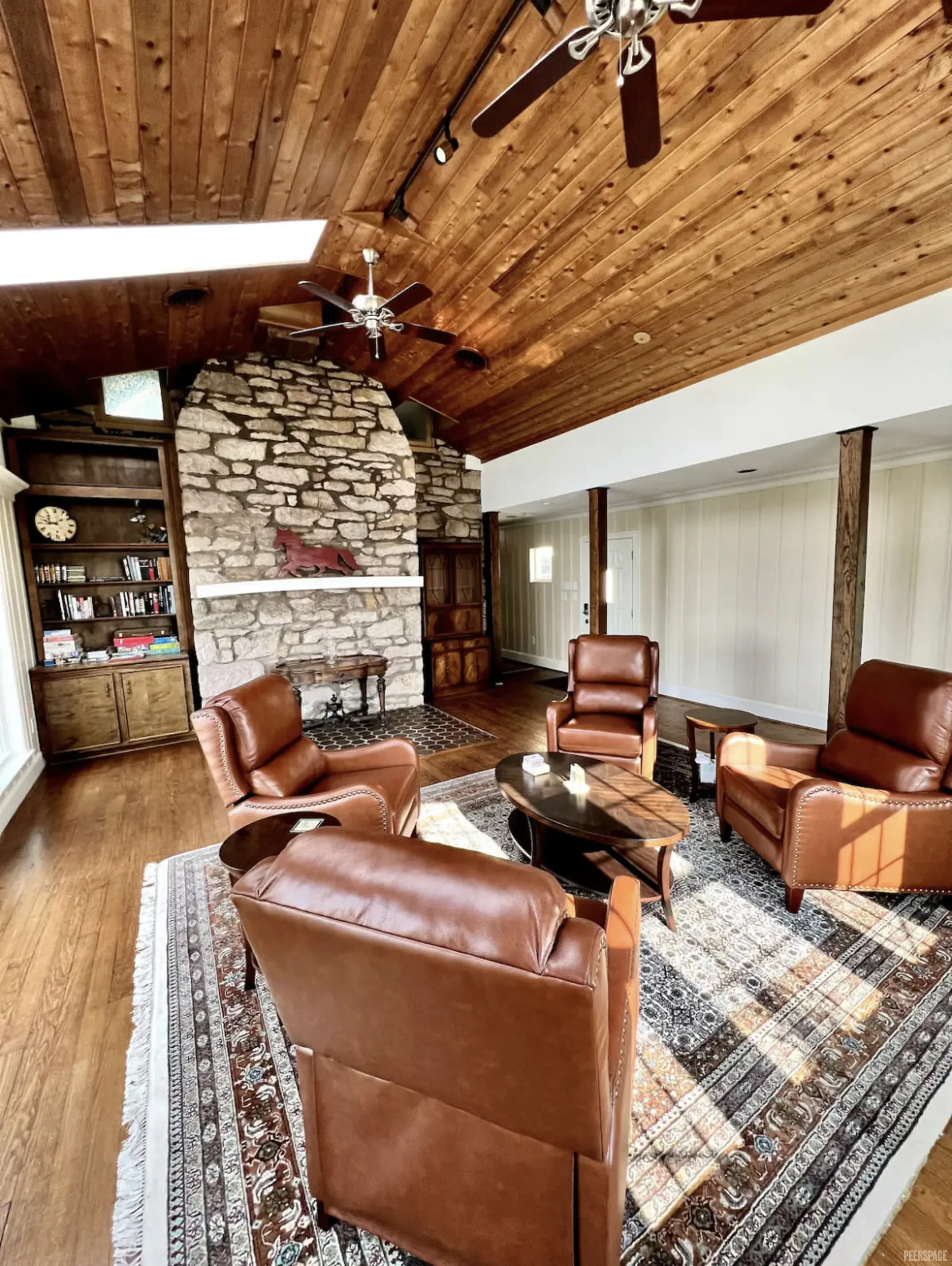 Cozy chairs arranged on a rug in a farmhouse for a craft retreat near Washington, DC