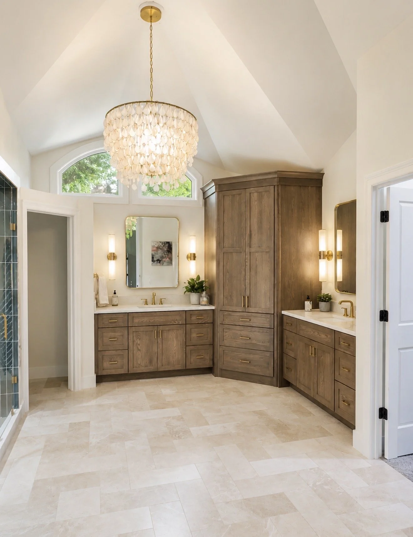 Primary Bath with new cabinets and marble herringbone floor
