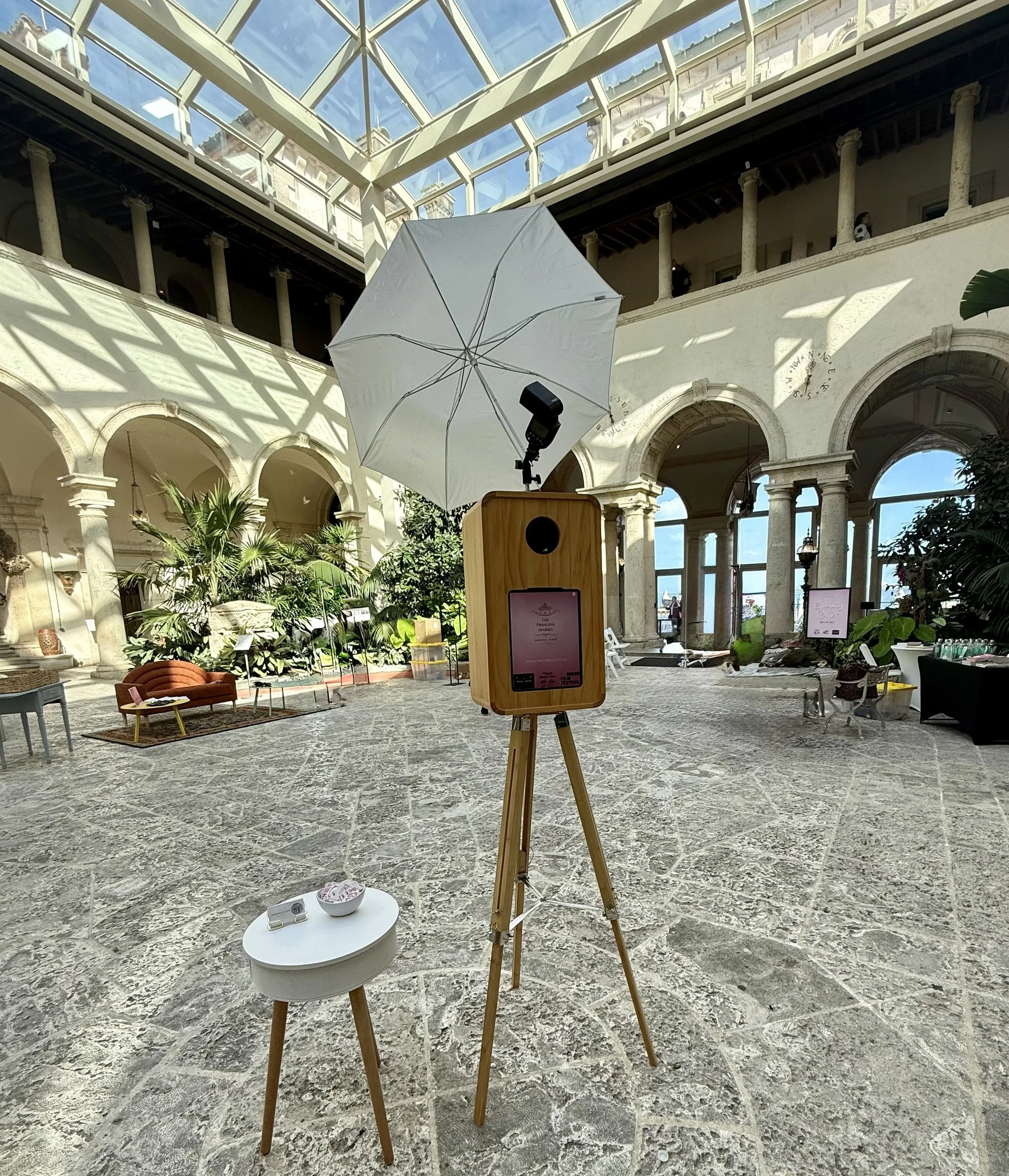 Wooden open-air photo booth at a Miami event