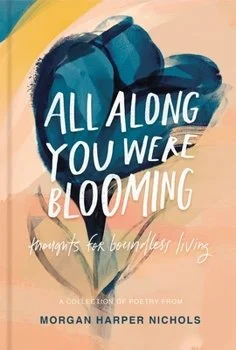 Cover of a book with an abstract watercolor background in shades of blue, yellow, and peach. The title reads 'All Along You Were Blooming' with the subtitle 'Thoughts for Nourishing Living' and the author's name, Morgan Harper Nichols.