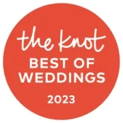 Red circular logo with white text reading 'the knot' at the top, followed by 'Best of Weddings' in larger font, and the year '2023' at the bottom.