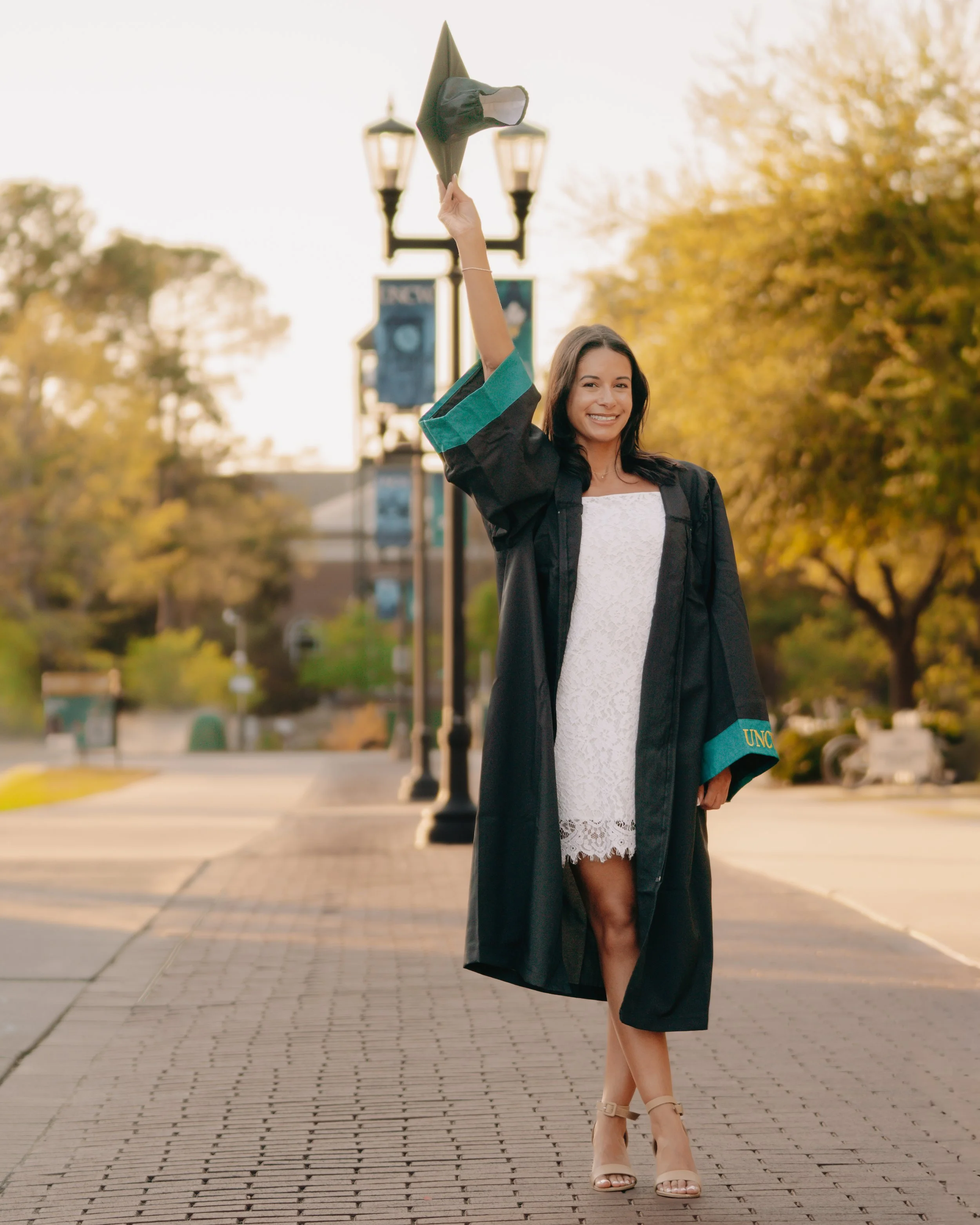UNCW graduate posing - Wilmington, NC photographer