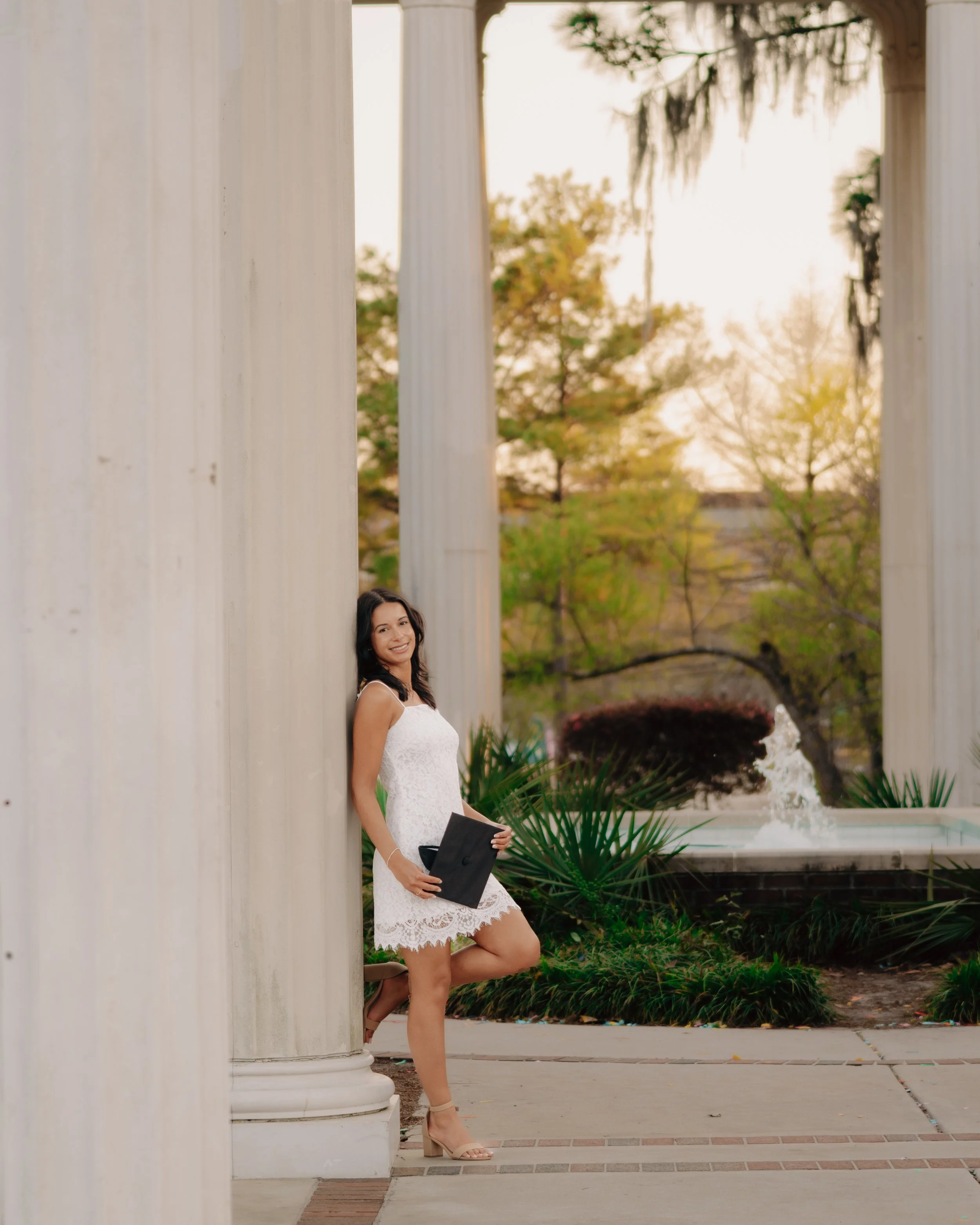 UNCW graduate posing - Wilmington, NC photographer
