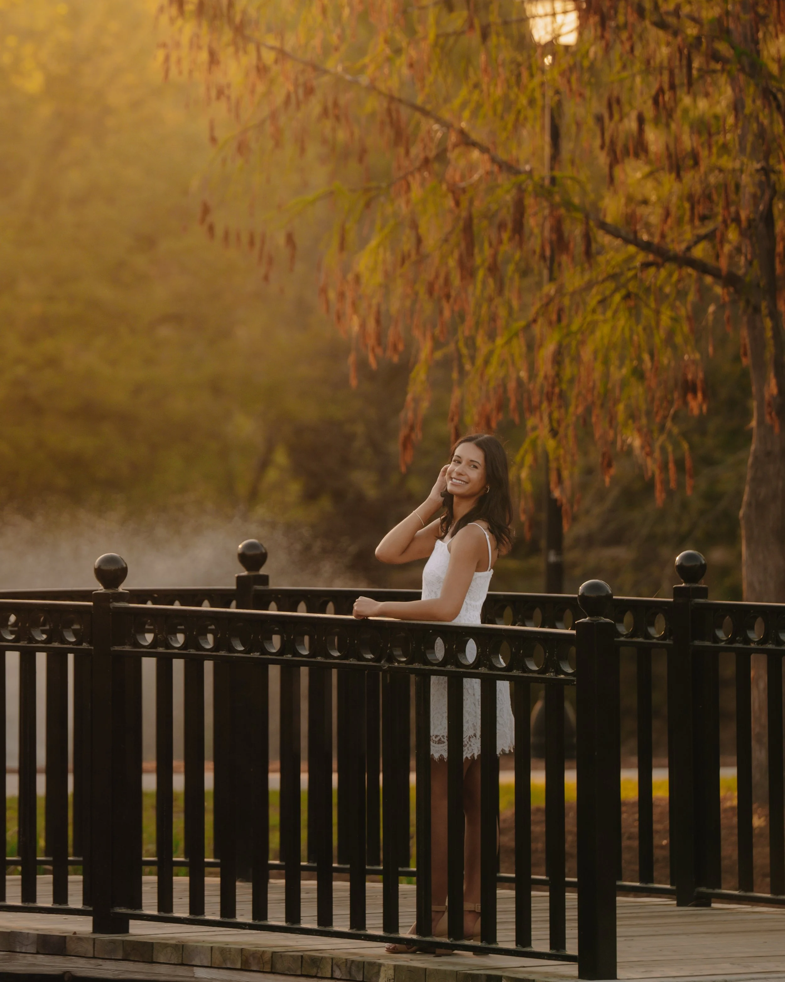 UNCW graduate posing - Wilmington, NC photographer