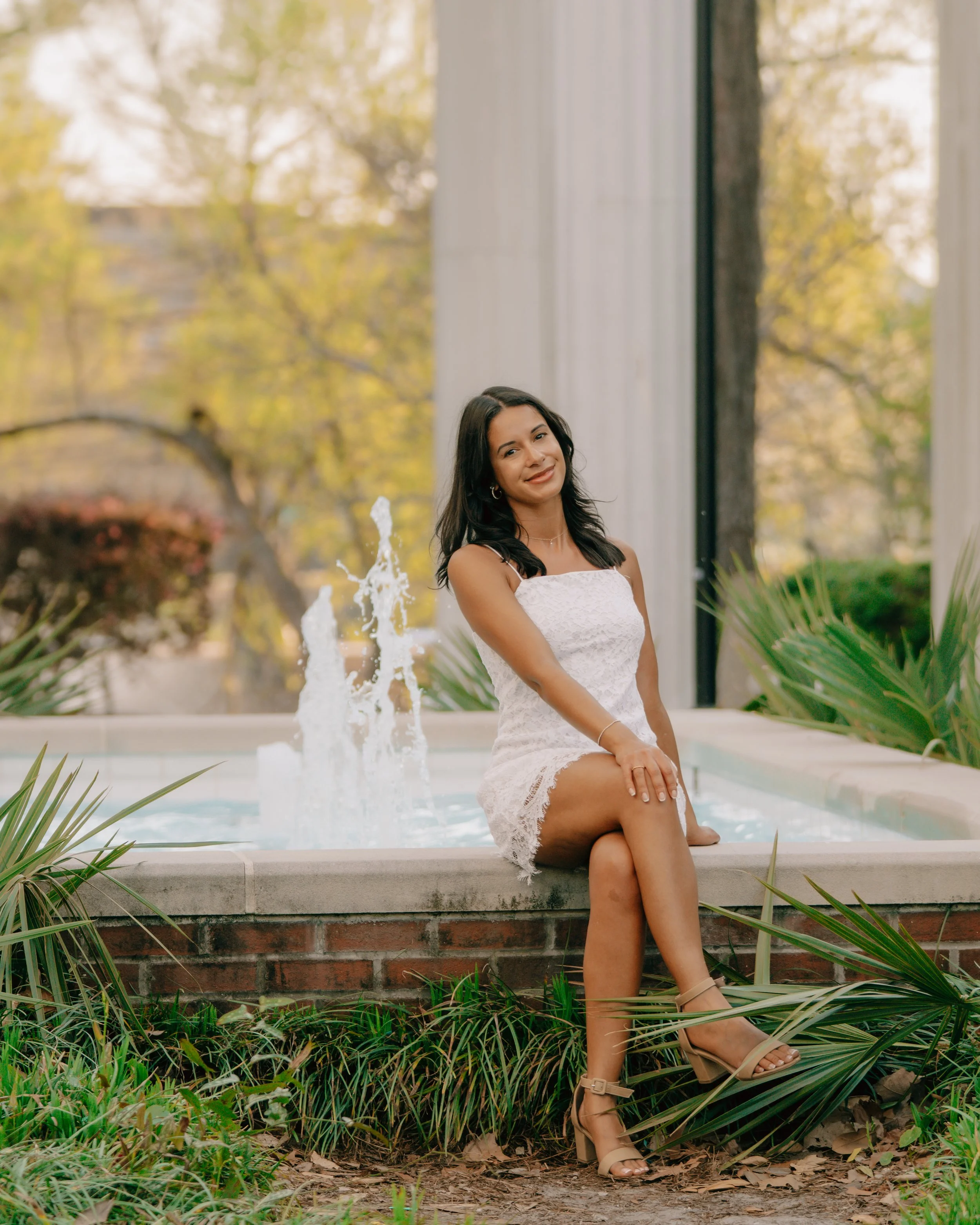 UNCW graduate posing - Wilmington, NC photographer