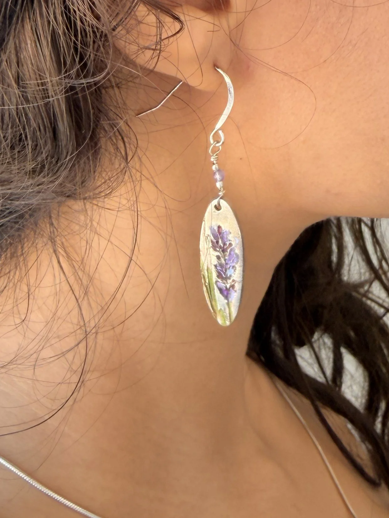 Model wearing Tucci'Z Designs Fine Silver Lavender Long Oval Earrings available at Bloomie's Boutique