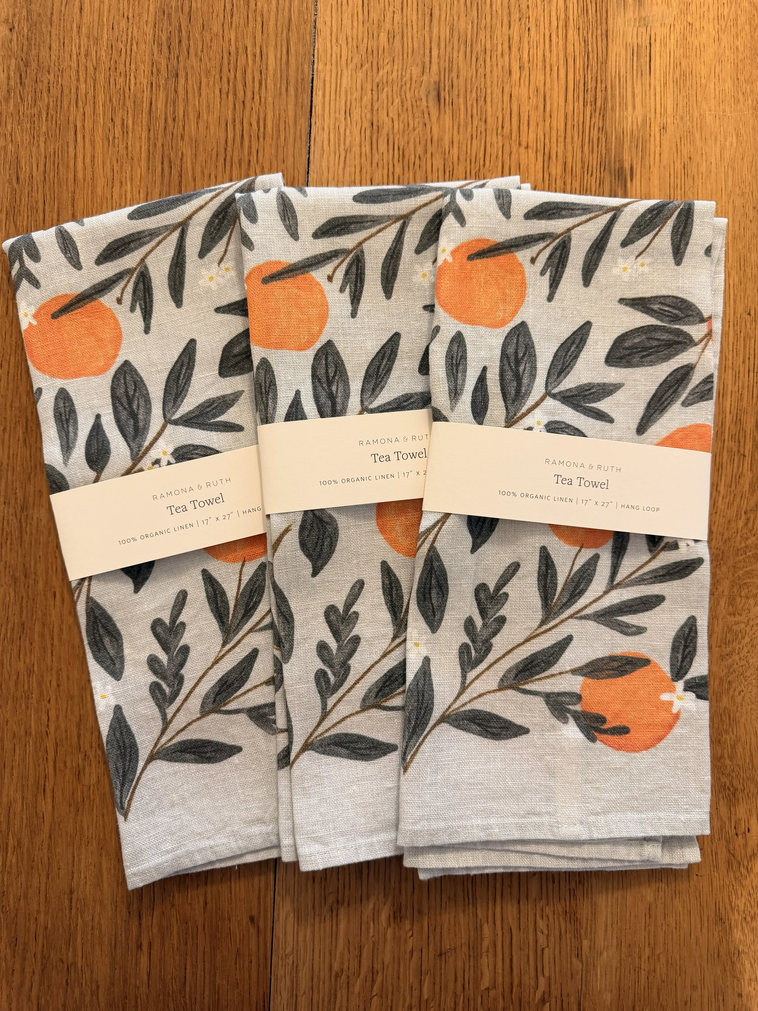 Oranges Linen Tea Towel 3 on Counter (Front View).jpg