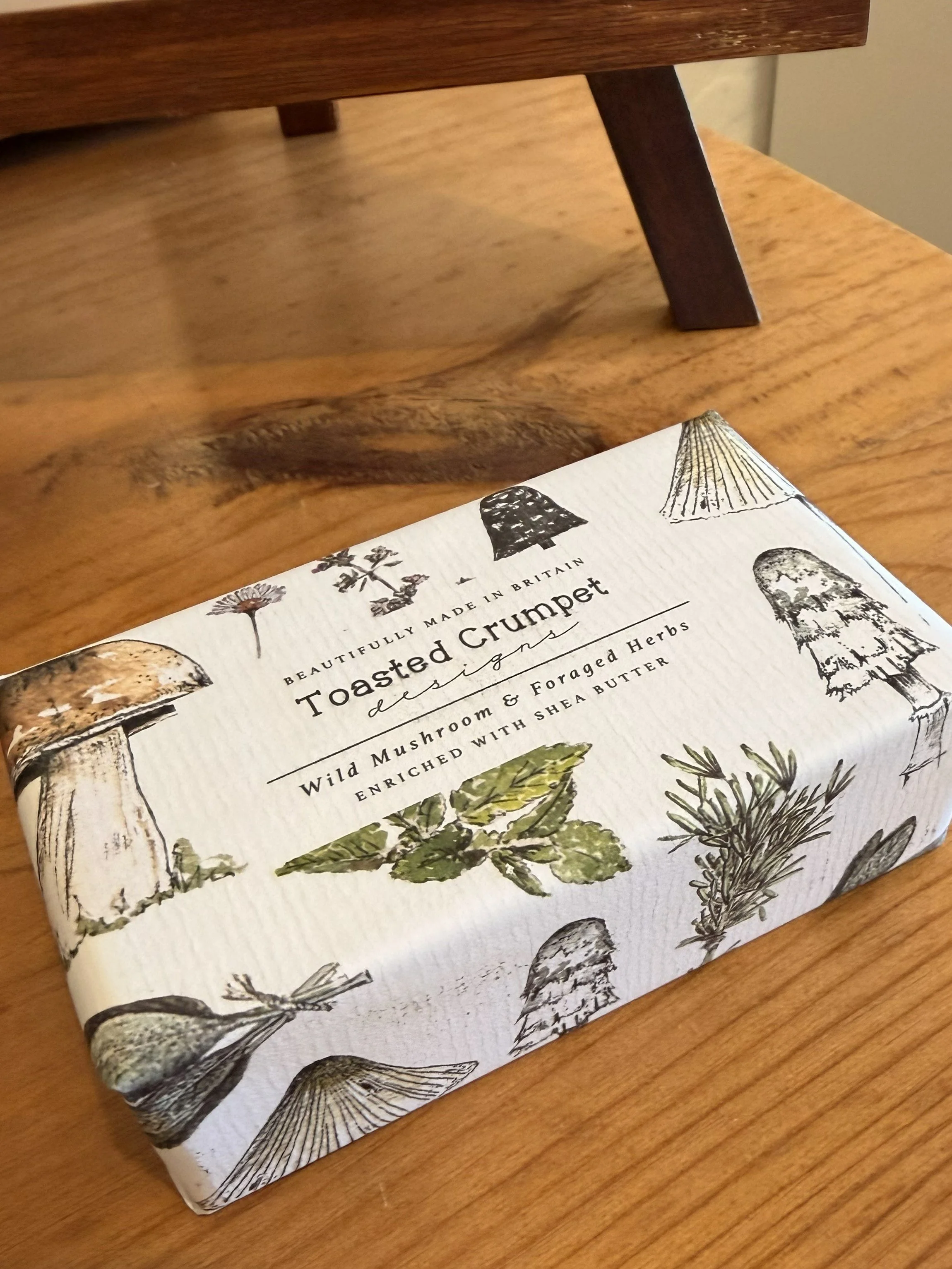 Toasted Crumpet Wild Mushroom and Foraged Herbs Soap styled on table