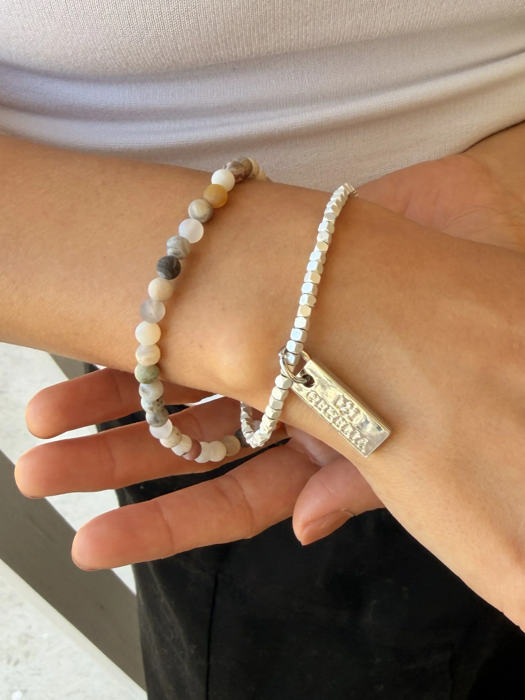 Close up of Bamboo Agate Gemstone Double Wrap Cecelia Designs Jewelry Bracelet on model's wrist