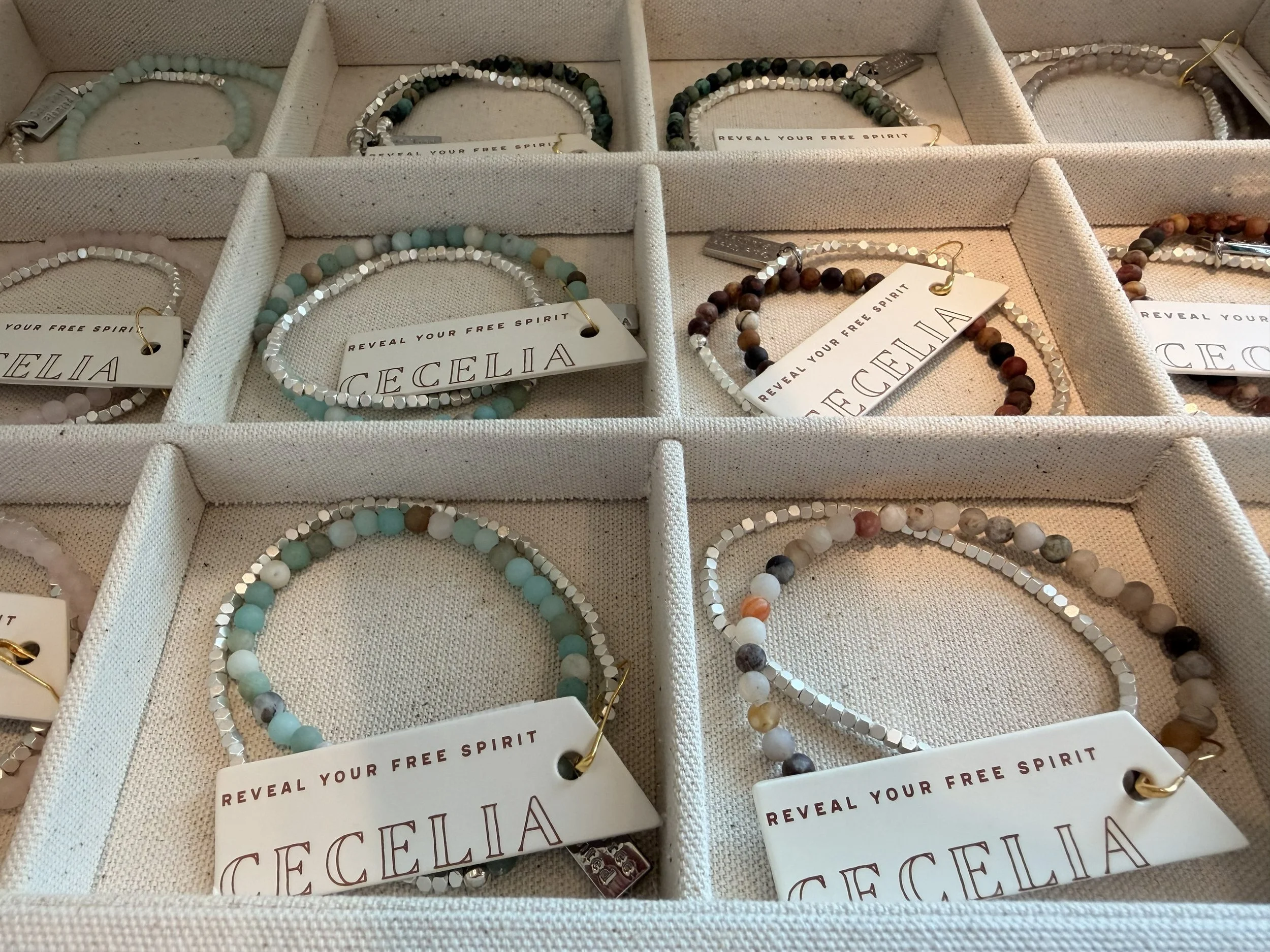Various Gemstone Double Wrap Bracelets by Cecelia Designs Jewelry on display at Bloomie's Boutique. (Photo credit: Melissa Mitchell-Hooge)