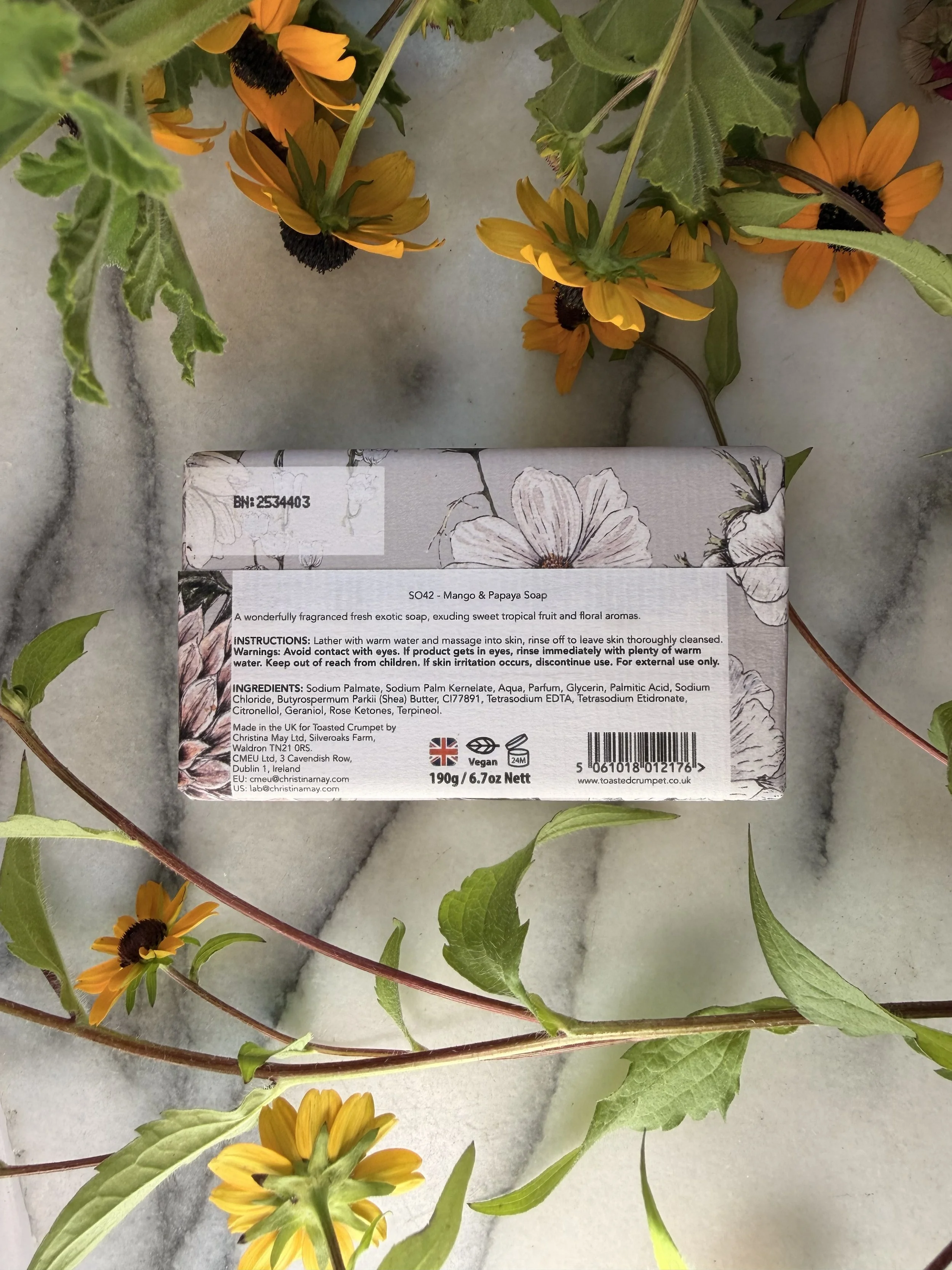 Back of Toasted Crumpet's Mango & Papaya Soap with flowers