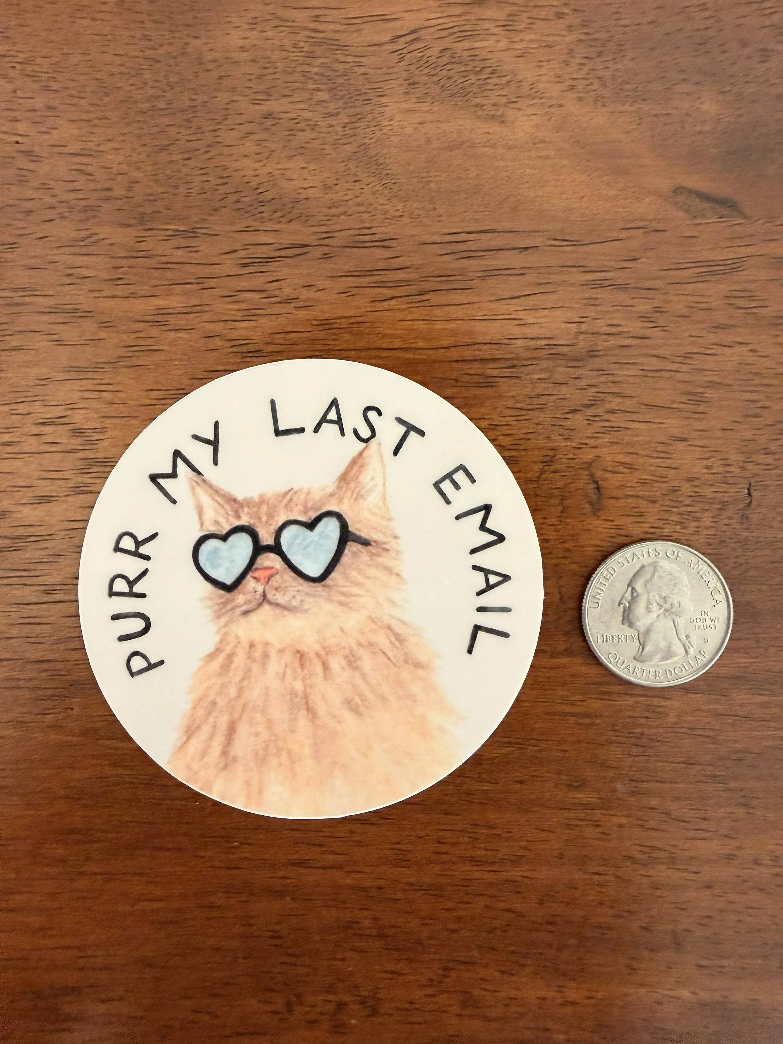 Purr My Last Email Sticker with quarter and wood background