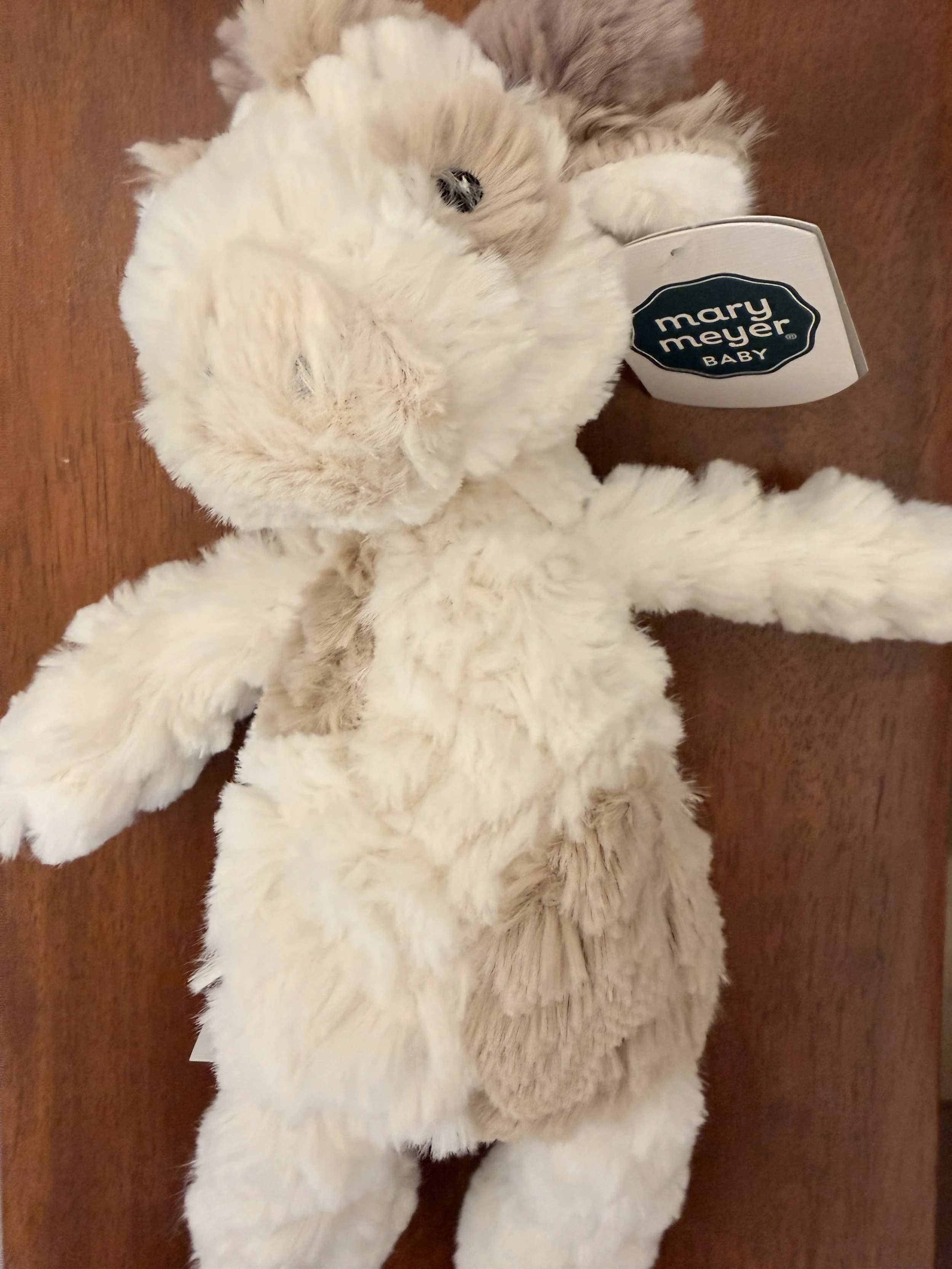 Close-up of Mary Meyer's Putty Nursery Giraffe stuffed animal toy