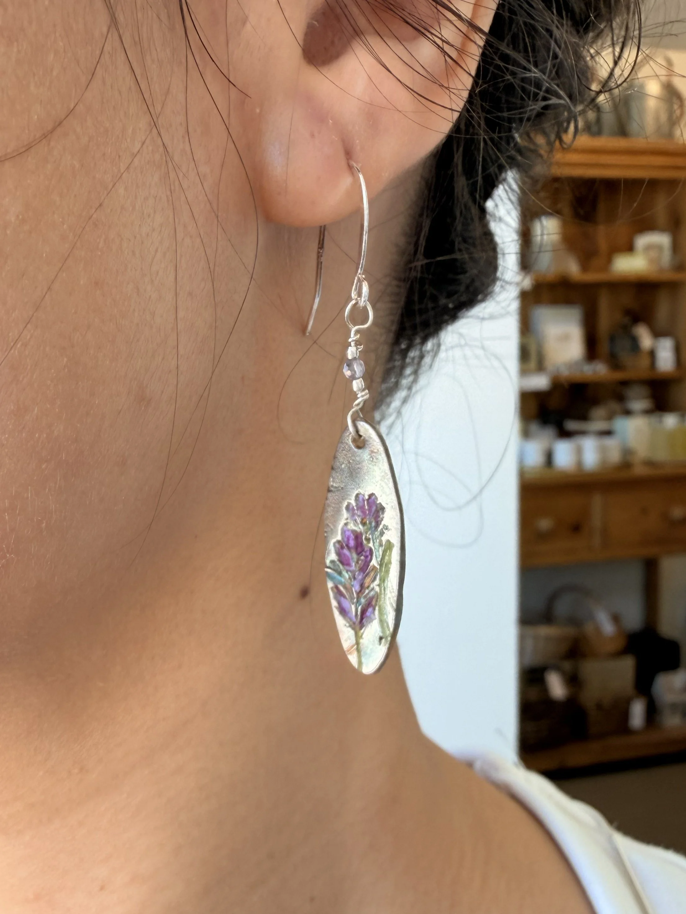 Model wearing Tucci'Z Designs Long Oval Fine Silver Lavender Earrings available at Bloomie's Boutique