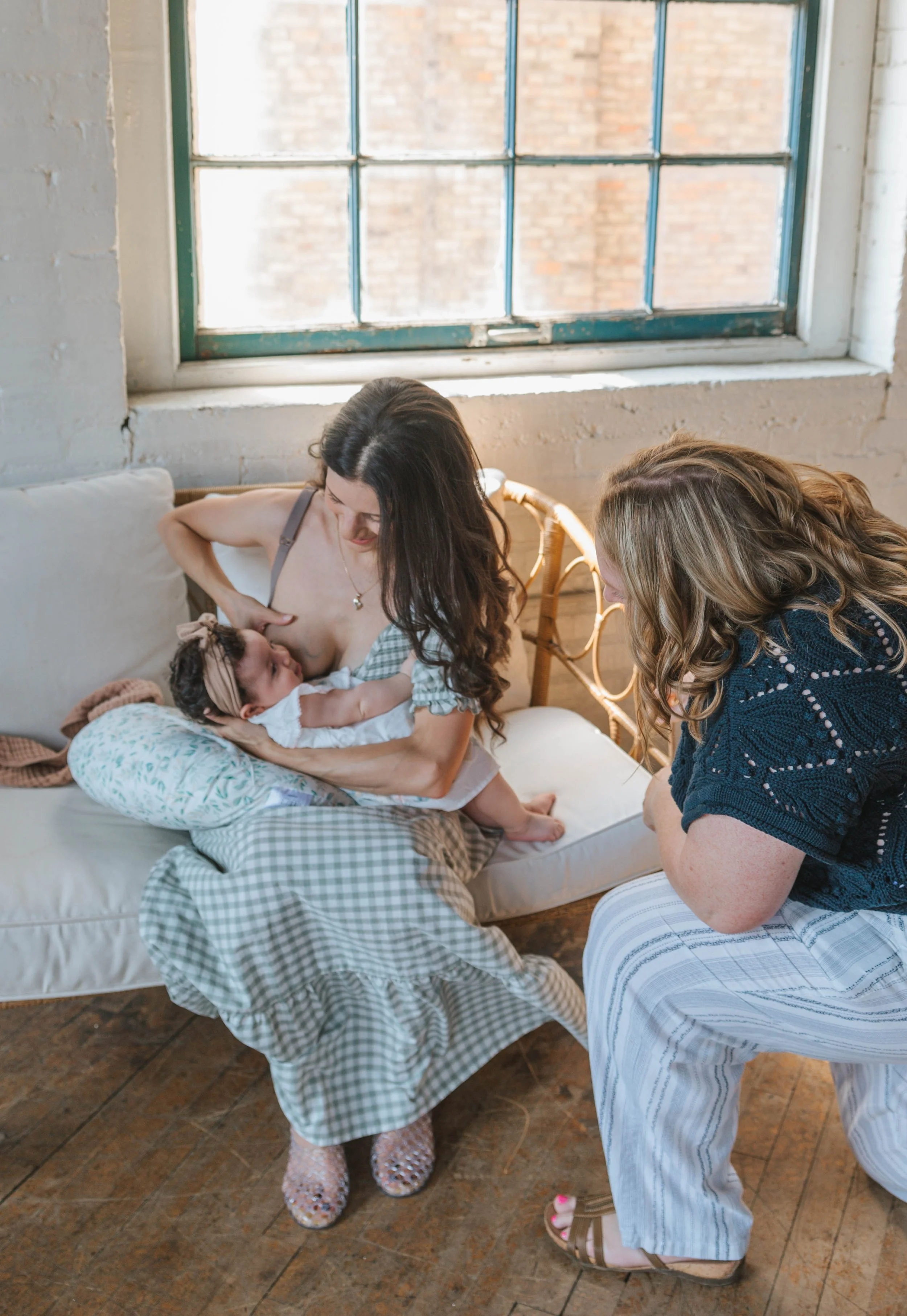 A new parent gets advice and support for latching, low milk supply, and weaning for her young baby.