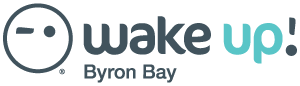 Wake Up Byron Bay logo with a stylized smiling face icon and text.