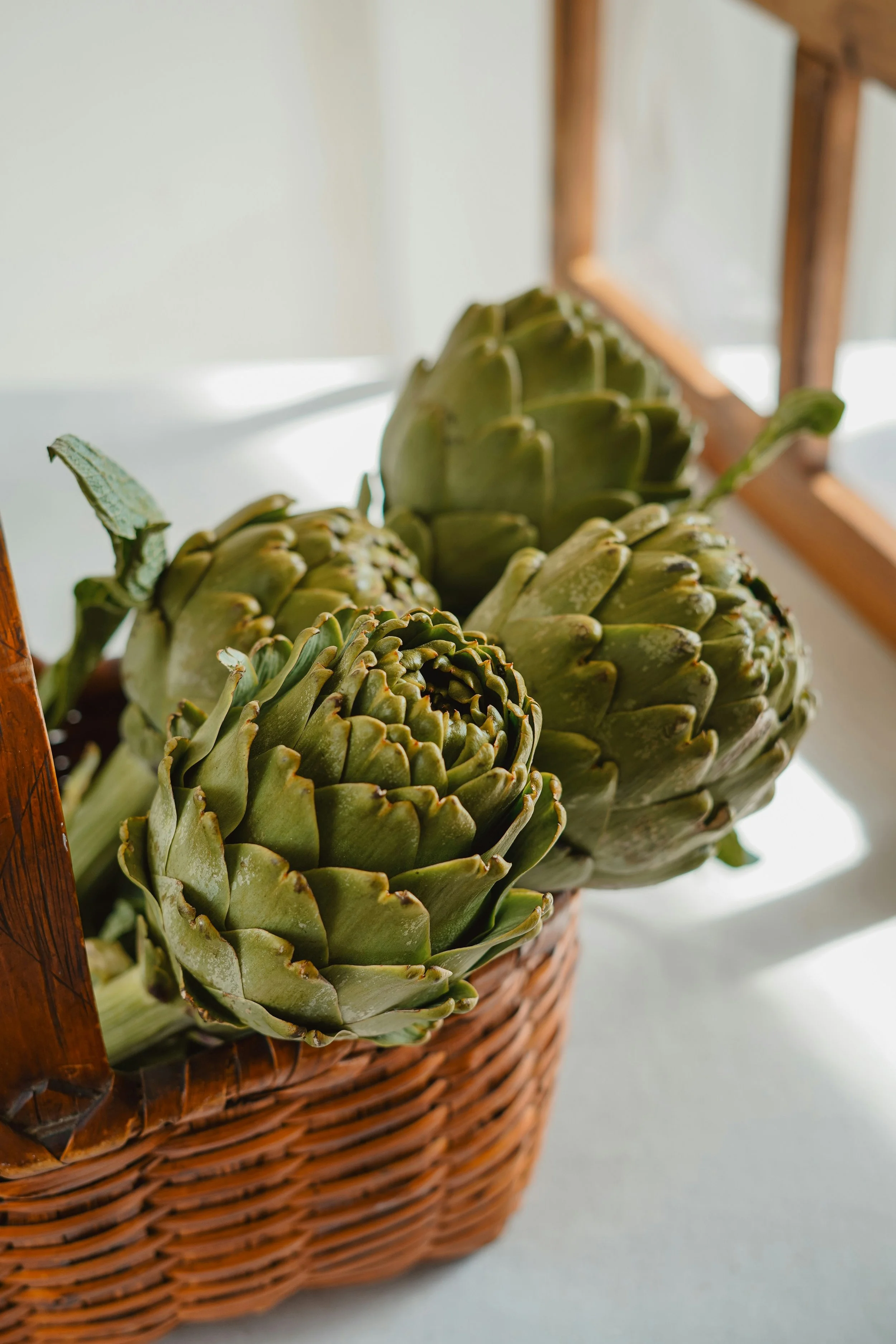 Fresh artichokes representing wholefood nutrition and metabolic health support