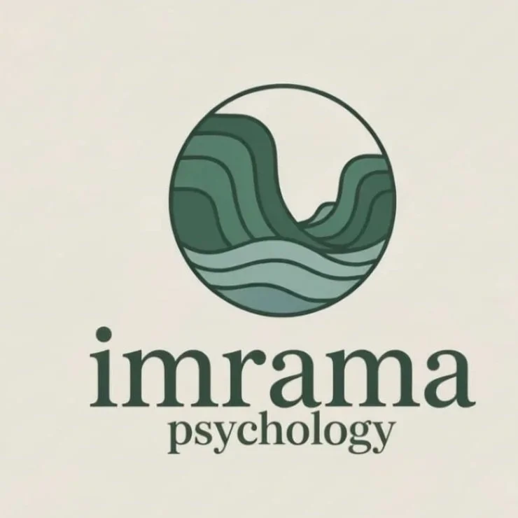 Logo for Imrama Psychology featuring a circular, stylized landscape with hills and water in shades of green and teal.