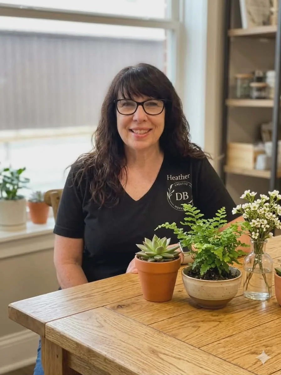 Heather, founder of Creative Workshops That Bring People Together, welcoming guests to a floral workshop.