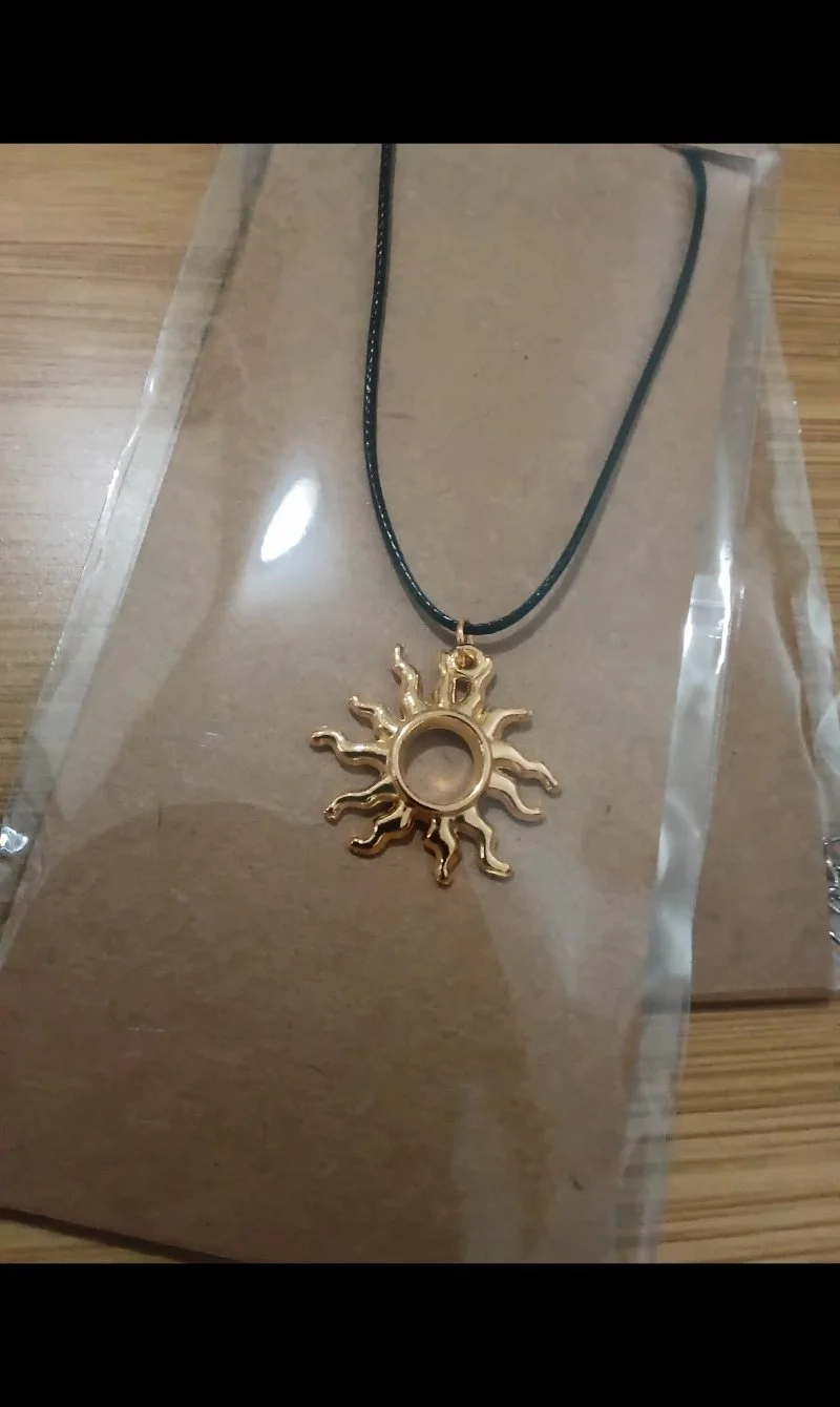 Gold Hollow Center Sun Pendant Cord Necklace
