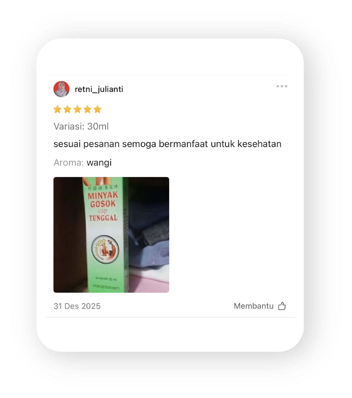 An online review from retni_julianti giving five stars to a 30ml bottle of cooking oil, with the review written in Indonesian praising its benefits for health and indicating a fragrant aroma.