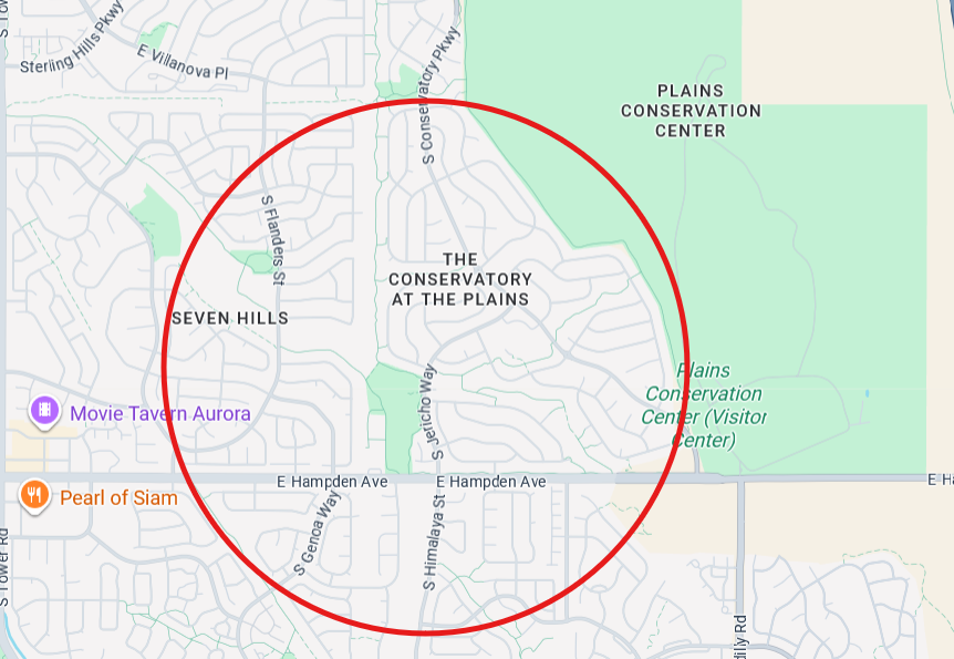 Map highlighting the area around the Plains Conservation Center in Aurora, Colorado, with a red circle encompassing The Conservatory at the Plains, Seven Hills, Movie Tavern Aurora, and Pearl of Siam, with surrounding street names.