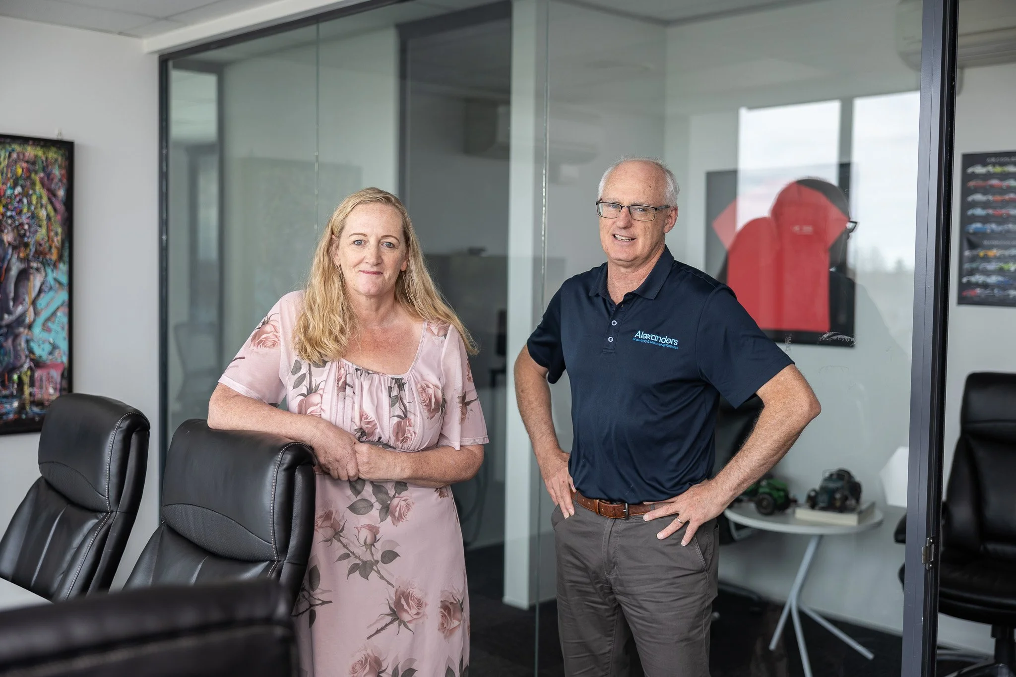Alister Stevenson and Karen Prue, Directors of Alexanders accountants, standing in the Alexanders office.