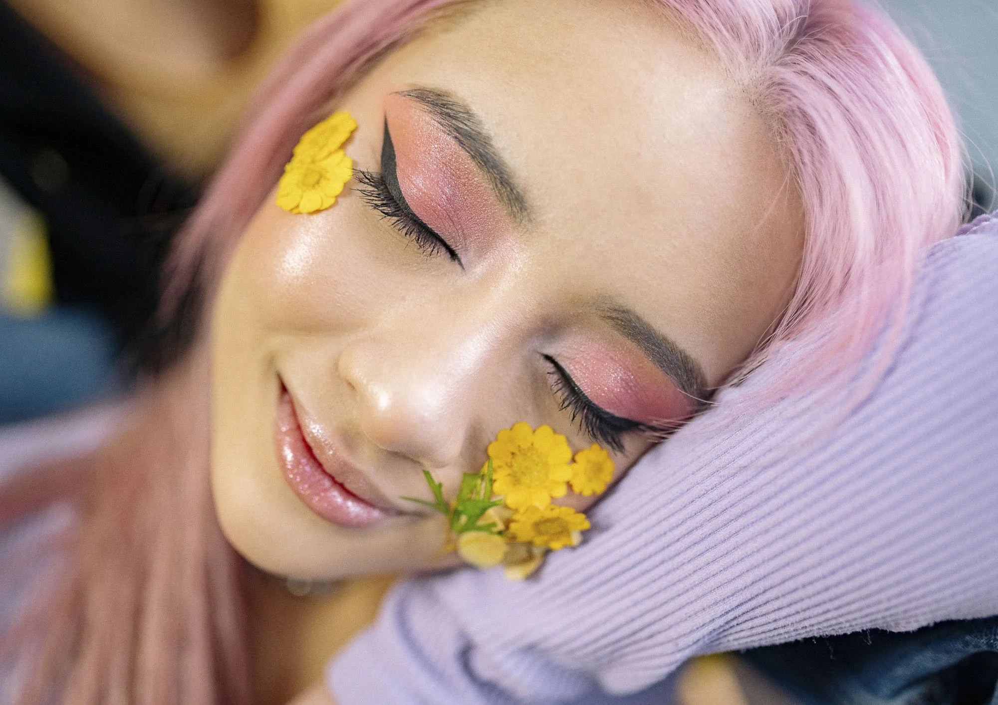 Young woman embracing self-expression, confidence and personal growth after life's challenges.