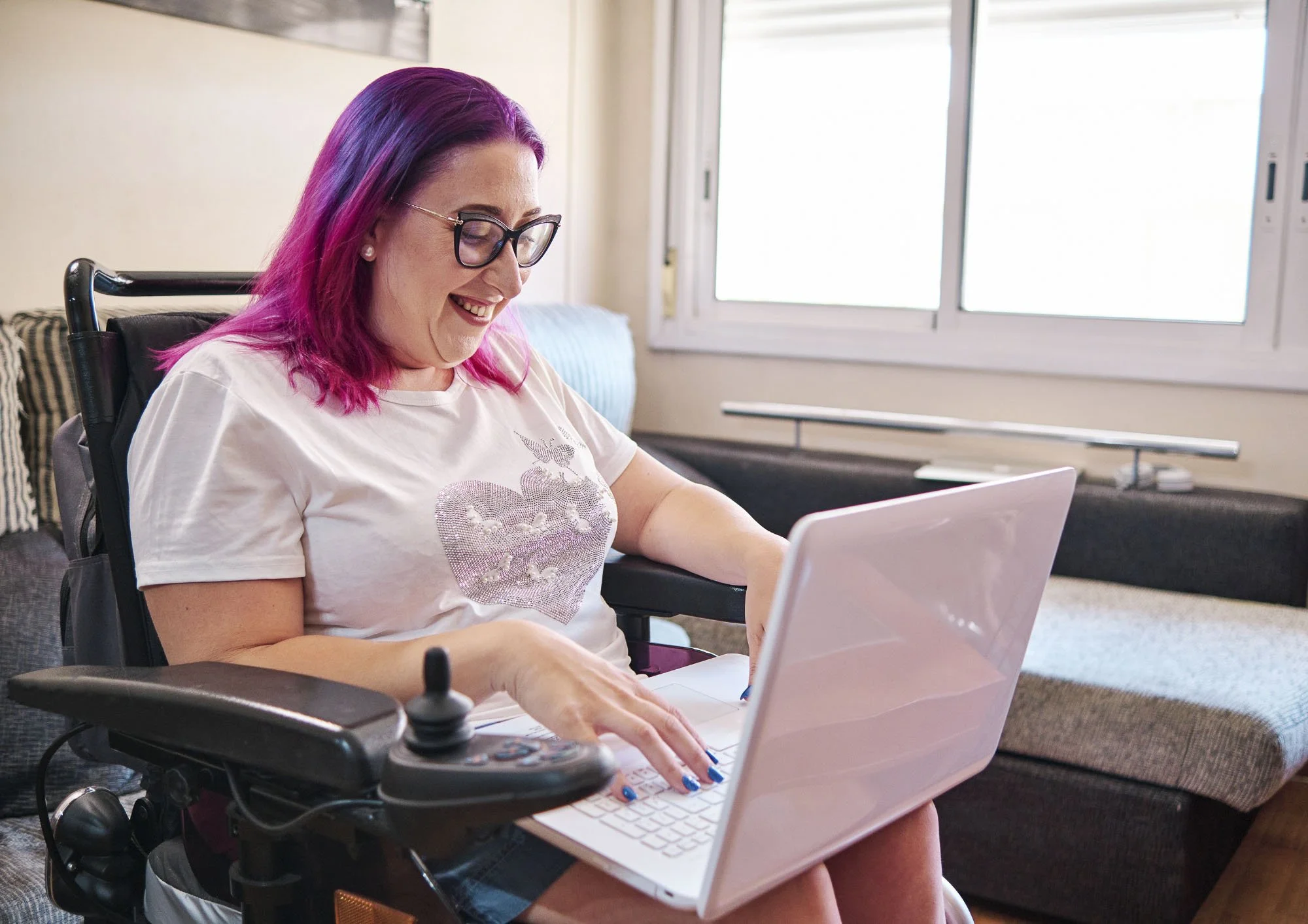Woman with disability building confidence, independence and career opportunities through supportive mentoring and recovery coaching.