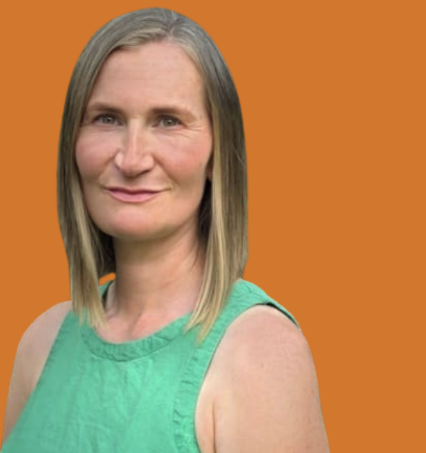 Portrait of a woman with shoulder-length blonde hair, wearing a sleeveless green top, against an orange background.