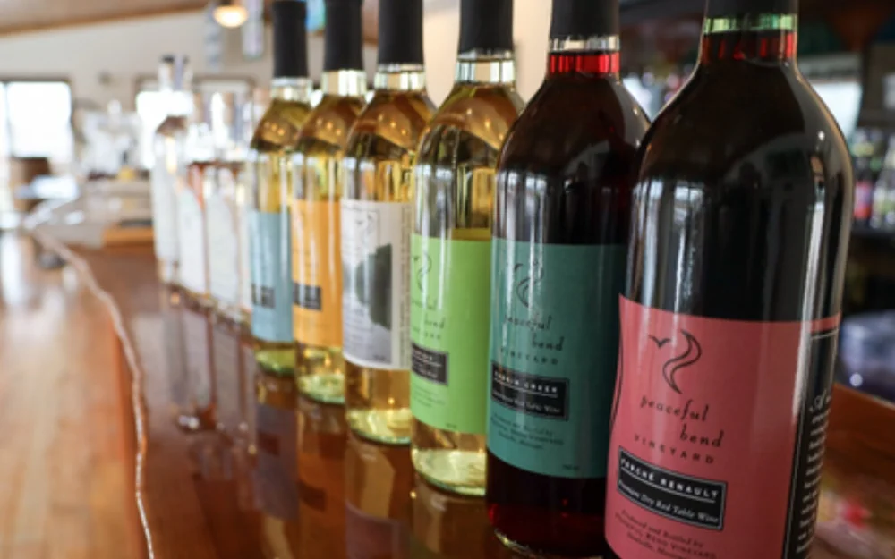 Bottles of handcrafted wine at Peaceful Bend Winery near Steelville, Missouri.