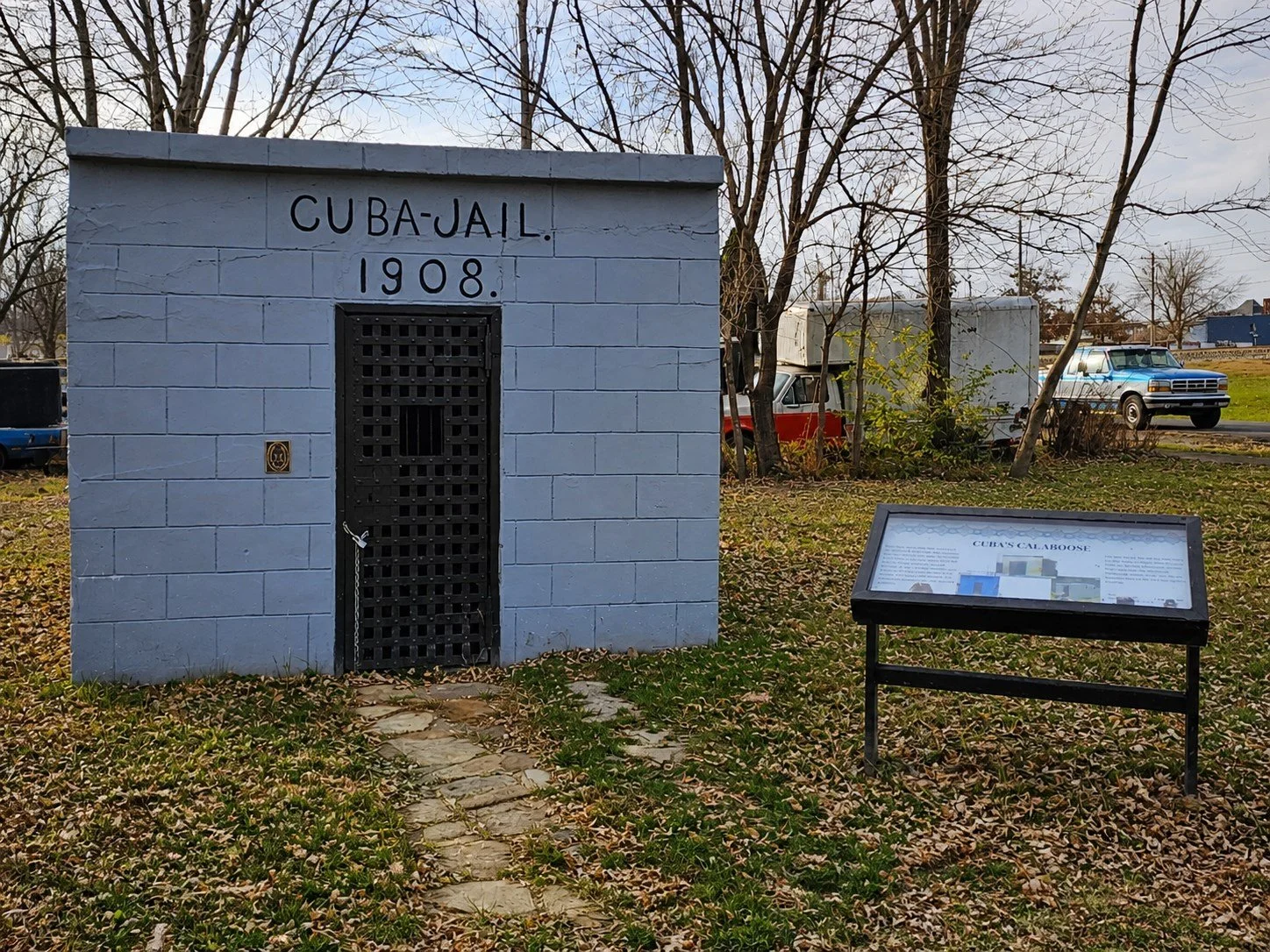 Cuba’s 1908 jail and interpretive marker near downtown Cuba, Missouri.