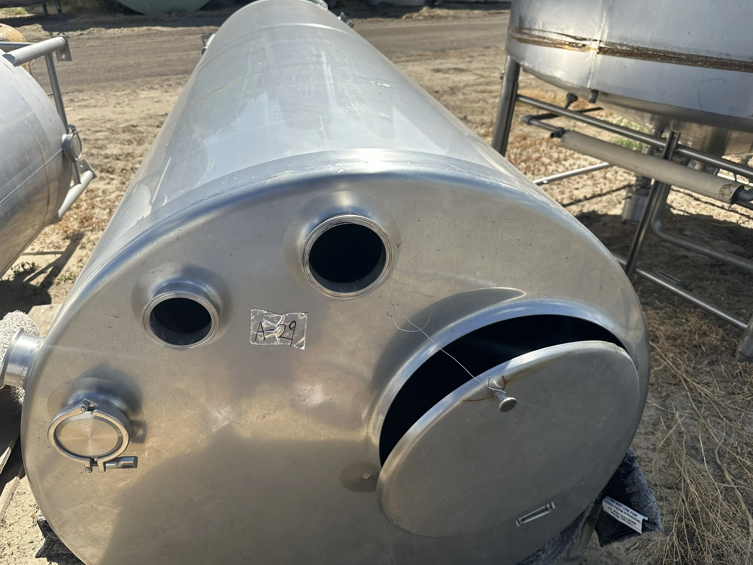 A29 2026 304 stainless 700 gallons tank on legs, food grade, sloped bottom, never used 
