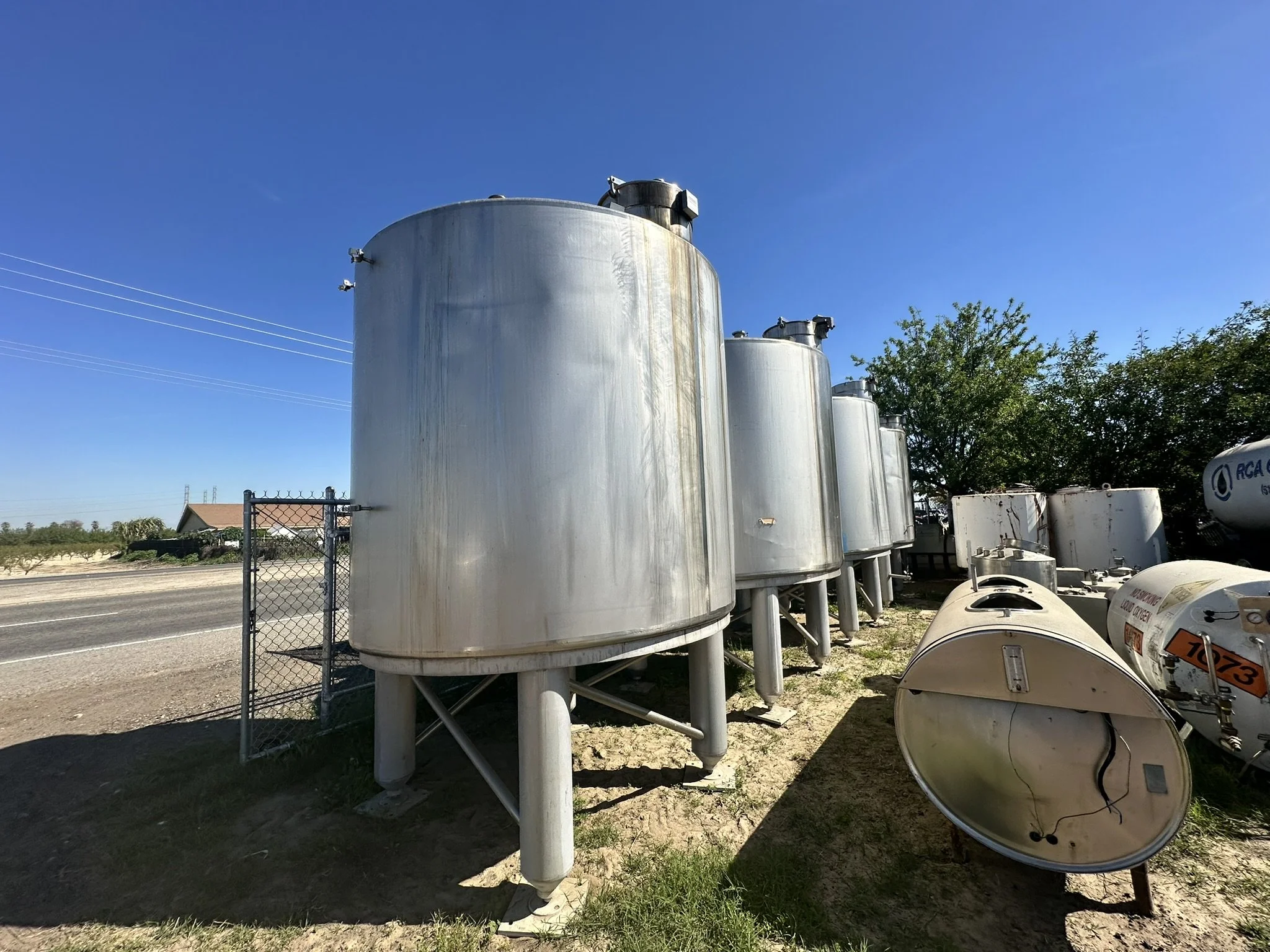 A20: (Multiple) 2,500 Stainless Steel Vertical Tanks 