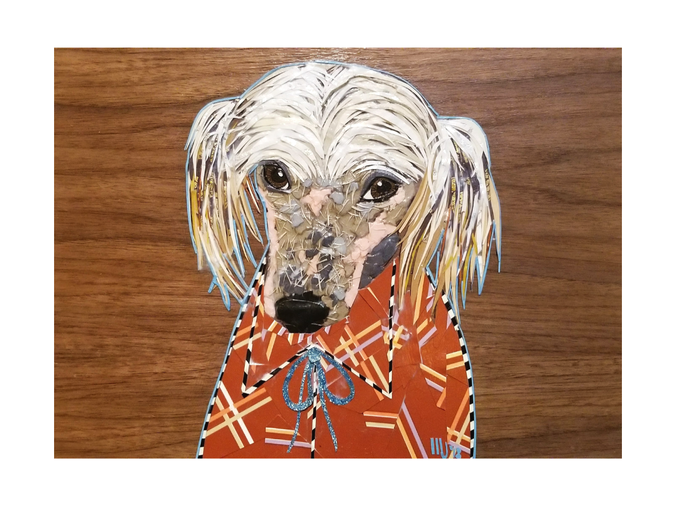 Paper collage on wood panel