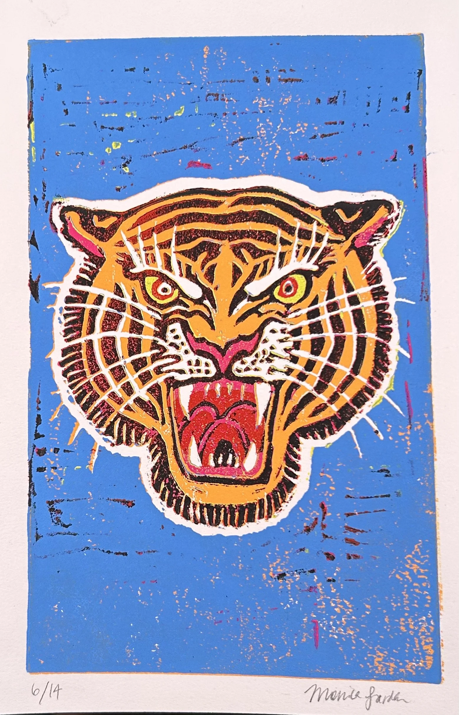 A colorful stylized tiger face with yellow eyes, open mouth showing teeth, on a bright blue background.