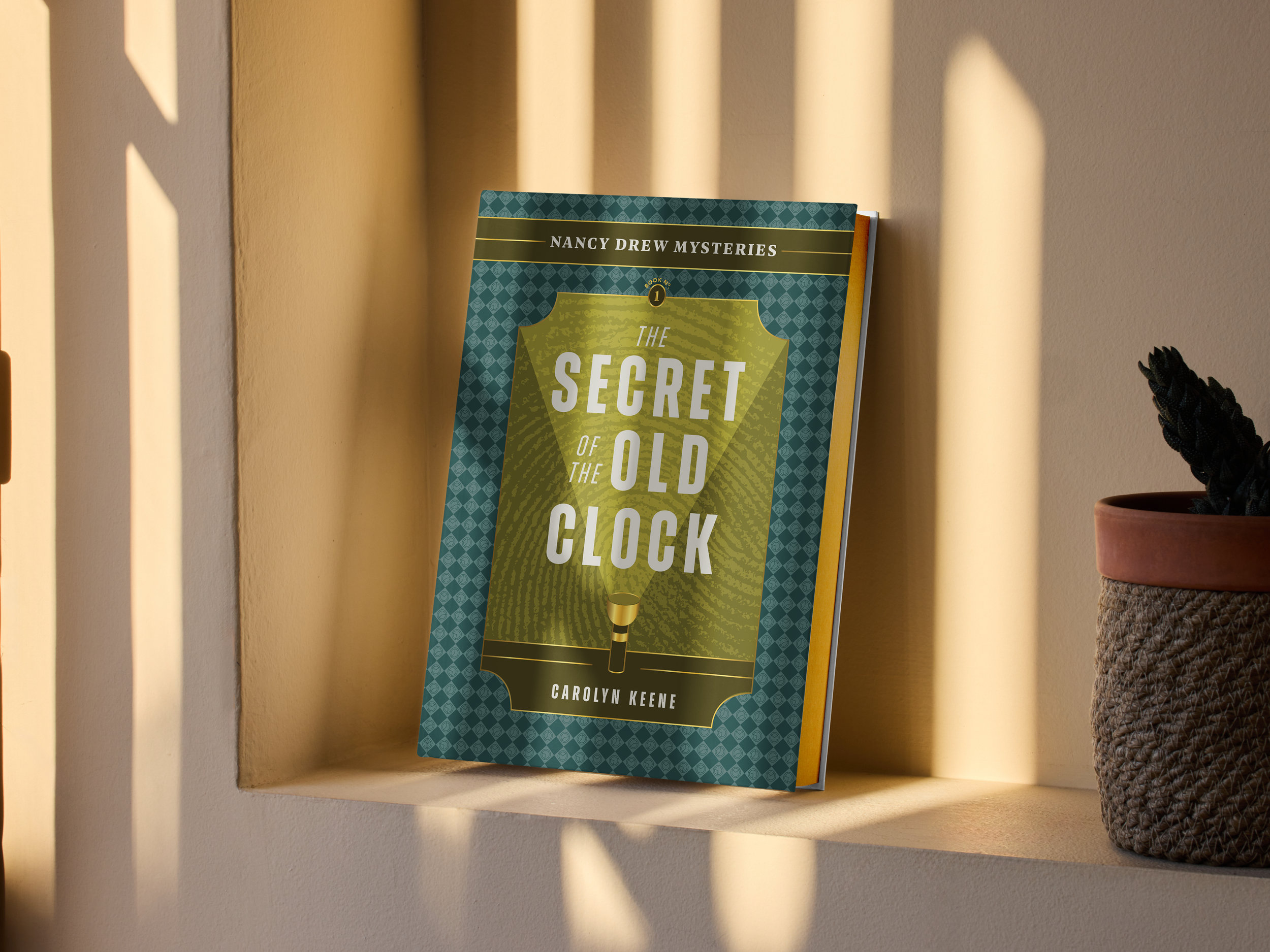 A book titled 'The Secret of the Old Clock' by Carolyn Keene leaning against a window ledge with sunlight casting shadow on the wall behind it. There is a potted plant with a woven basket container on the right side.