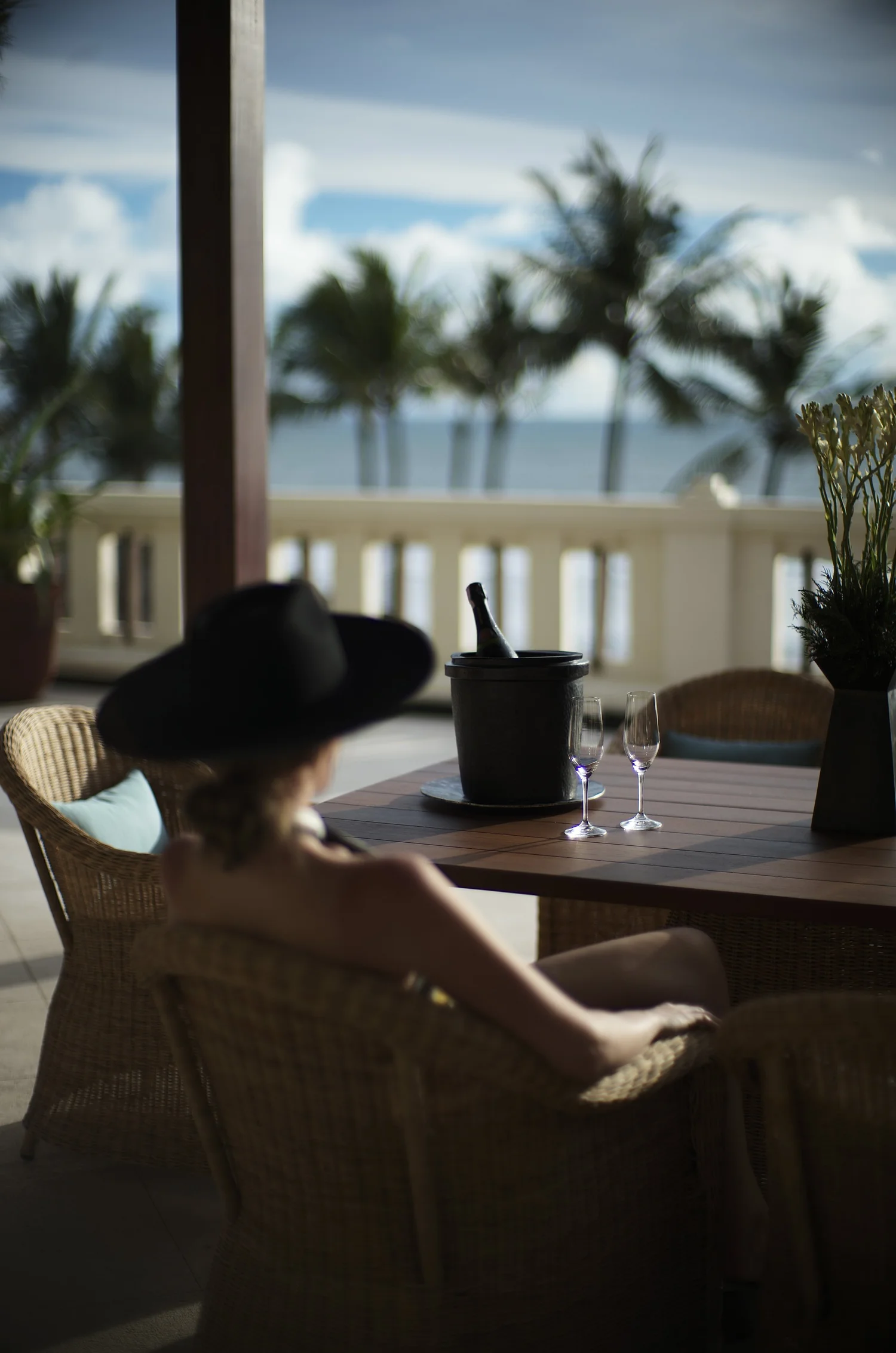 Resort photography at The Legian Seminyak, Bali — beachfront luxury hotel at sunset