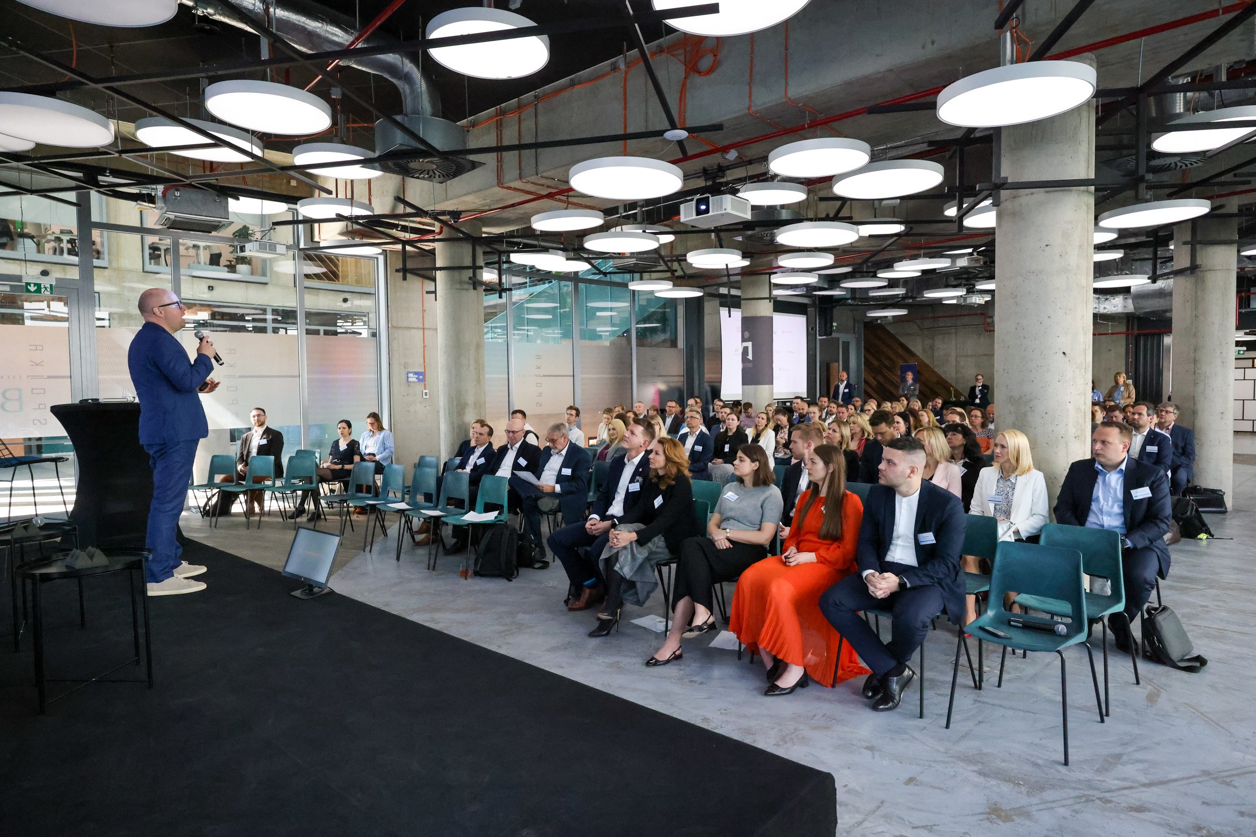 Tobias Sturesson speaking at a Compliance event in Prague in front of an audience. 