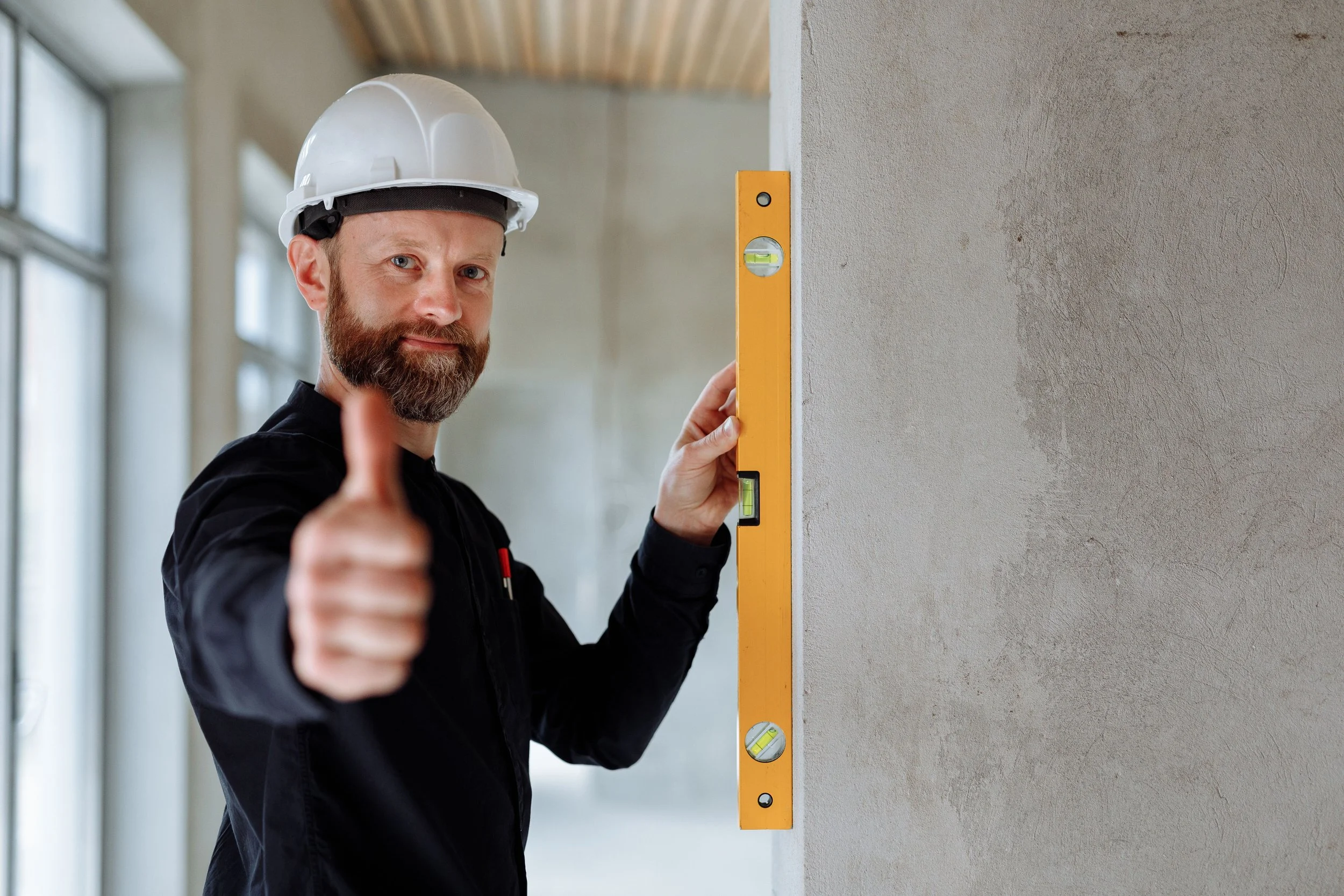 Friendly contractor giving thumbs-up - Z3 Collective