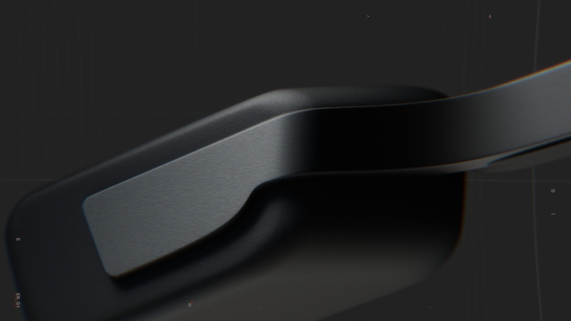 close-up of a black metallic object with angular design and lighting effects