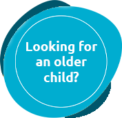 Blue circular button with white text that says, 'Looking for an older child?'